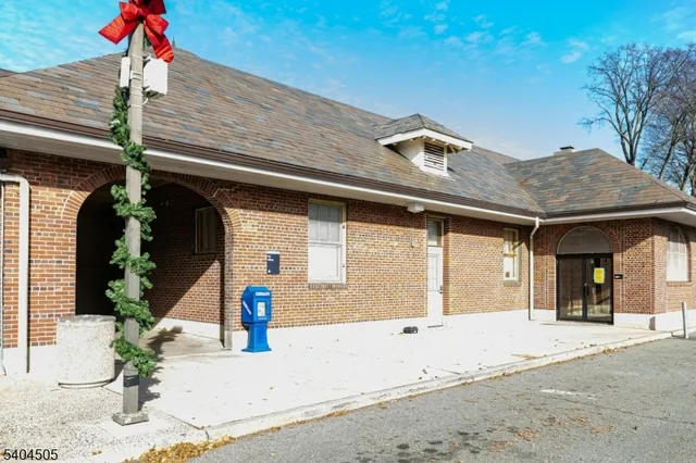 a front view of a house with street