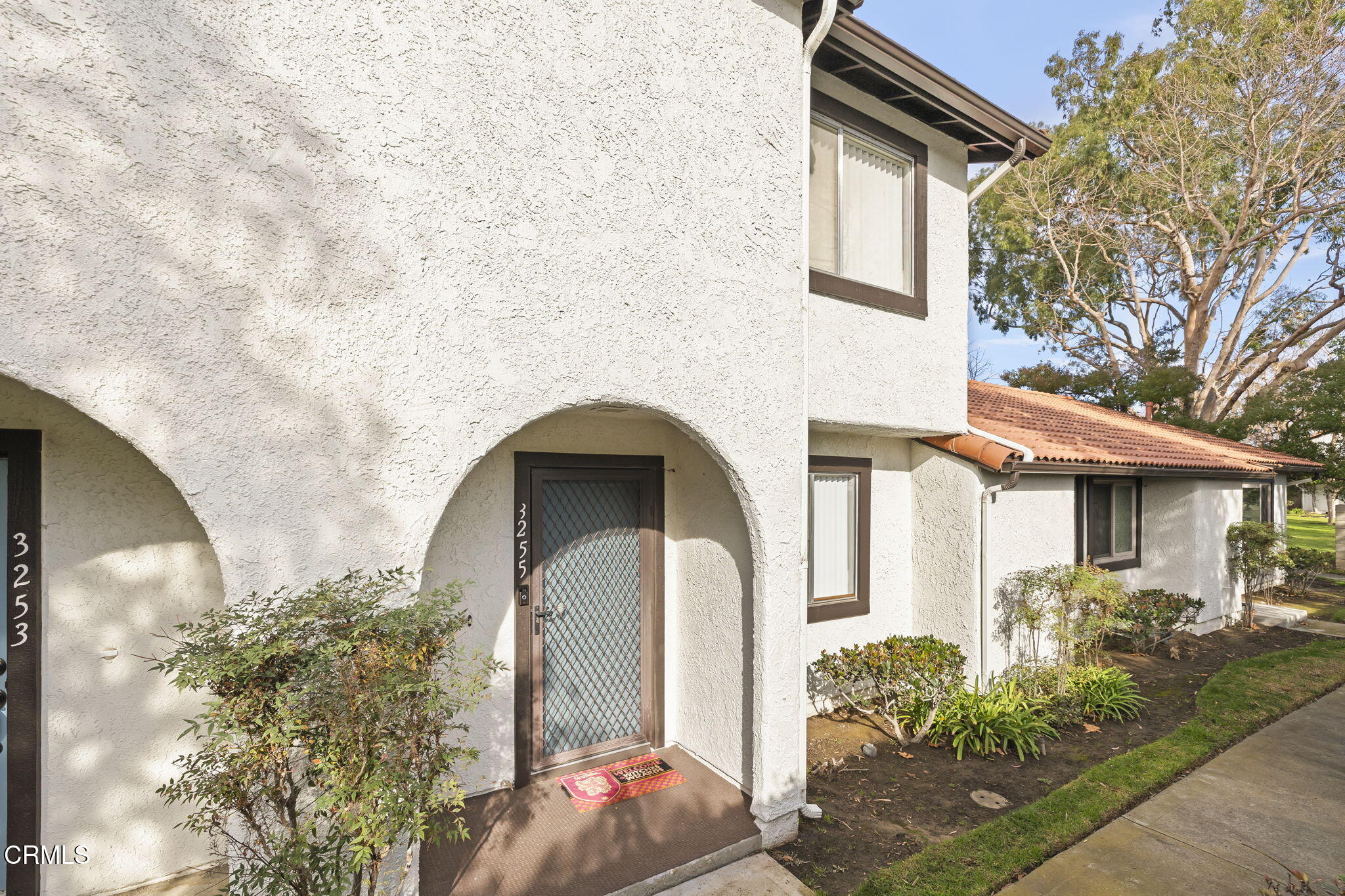 3255 Kelp Lane Oxnard, CA 93035 - Photo 15 of 45 a front view of a house with garden