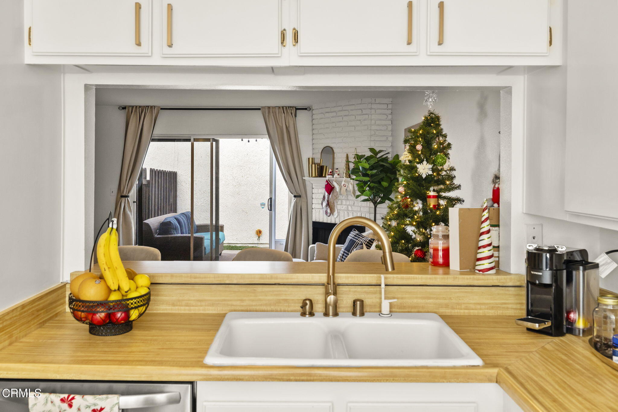 3255 Kelp Lane Oxnard, CA 93035 - Photo 16 of 45 a kitchen with a sink and a window