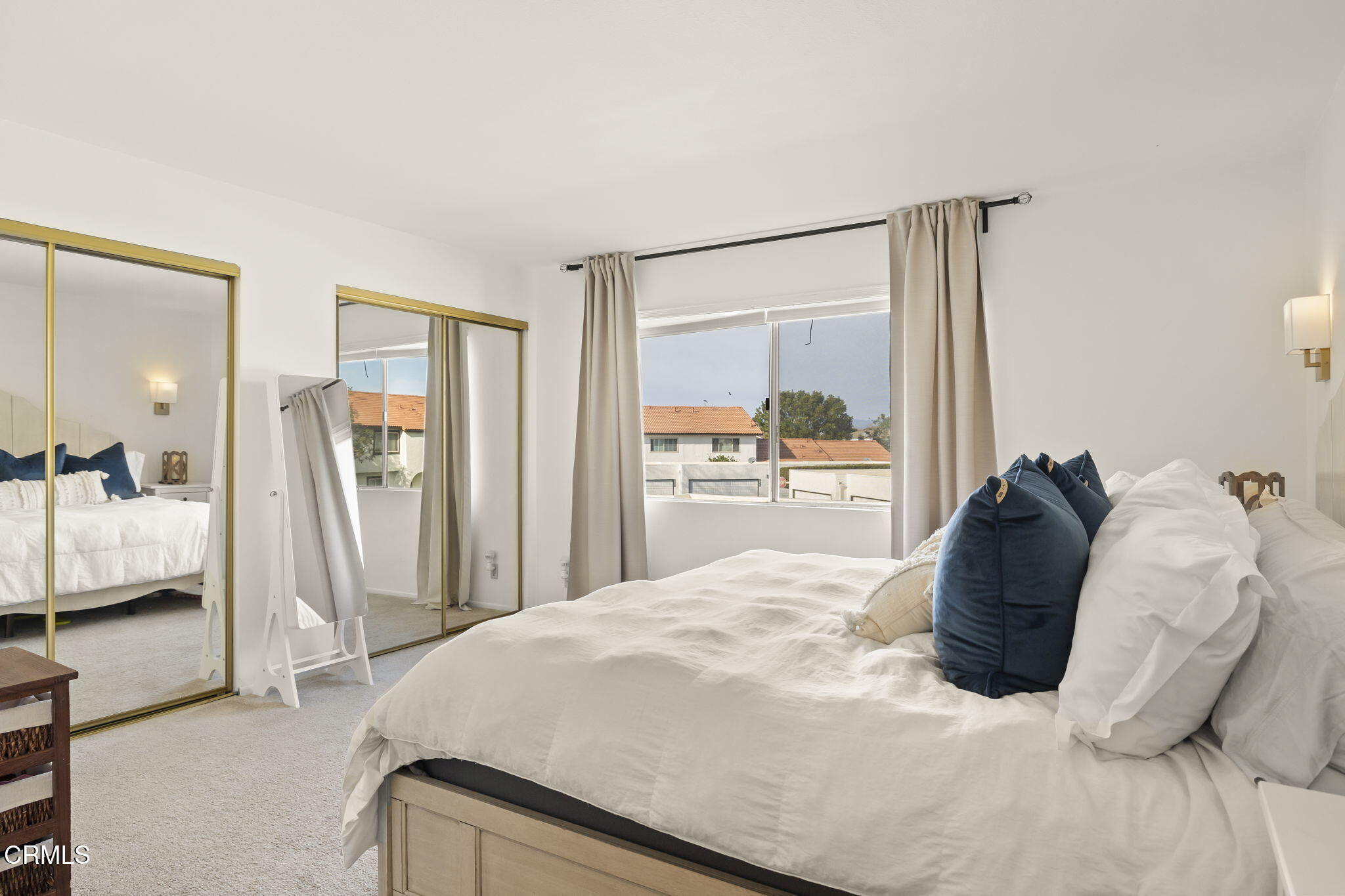 3255 Kelp Lane Oxnard, CA 93035 - Photo 21 of 45 a bed room with a bed and a large mirror