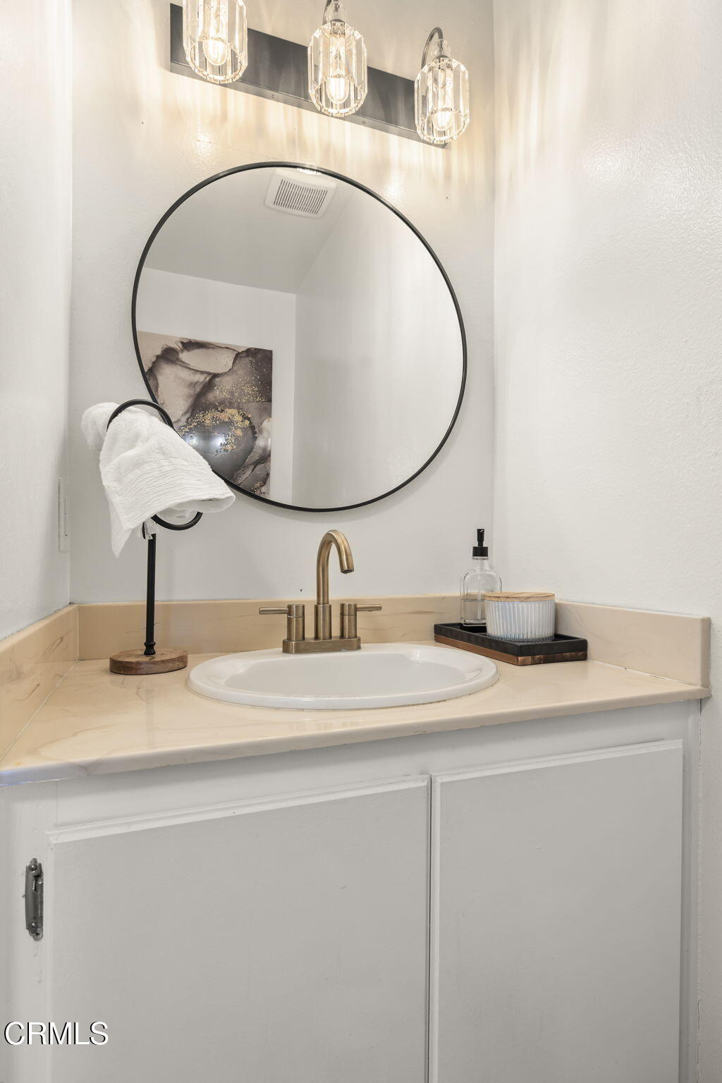 3255 Kelp Lane Oxnard, CA 93035 - Photo 27 of 45 a bathroom with a sink and a mirror