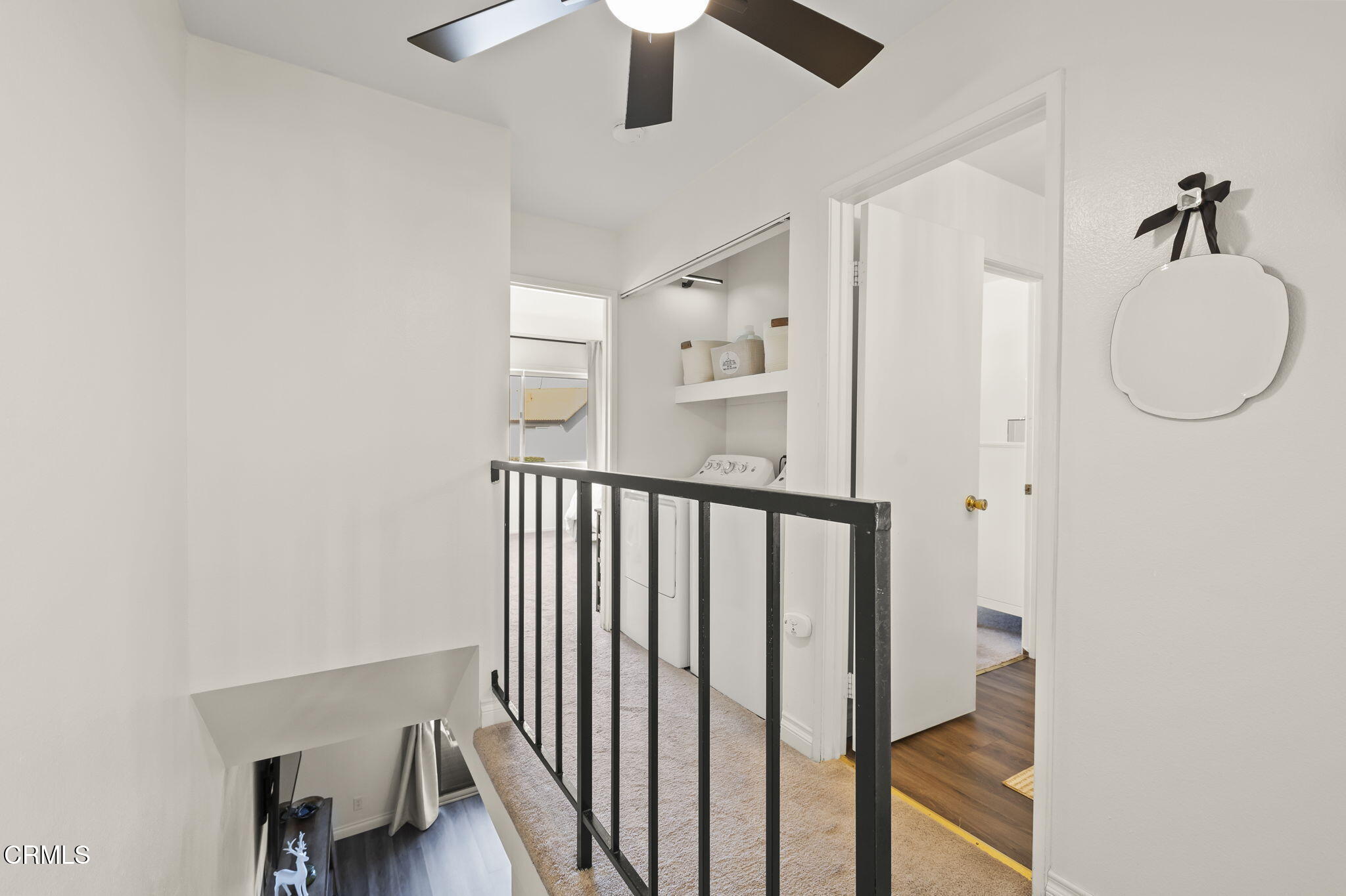 3255 Kelp Lane Oxnard, CA 93035 - Photo 28 of 45 a view of a hallway with wooden floor and entryway