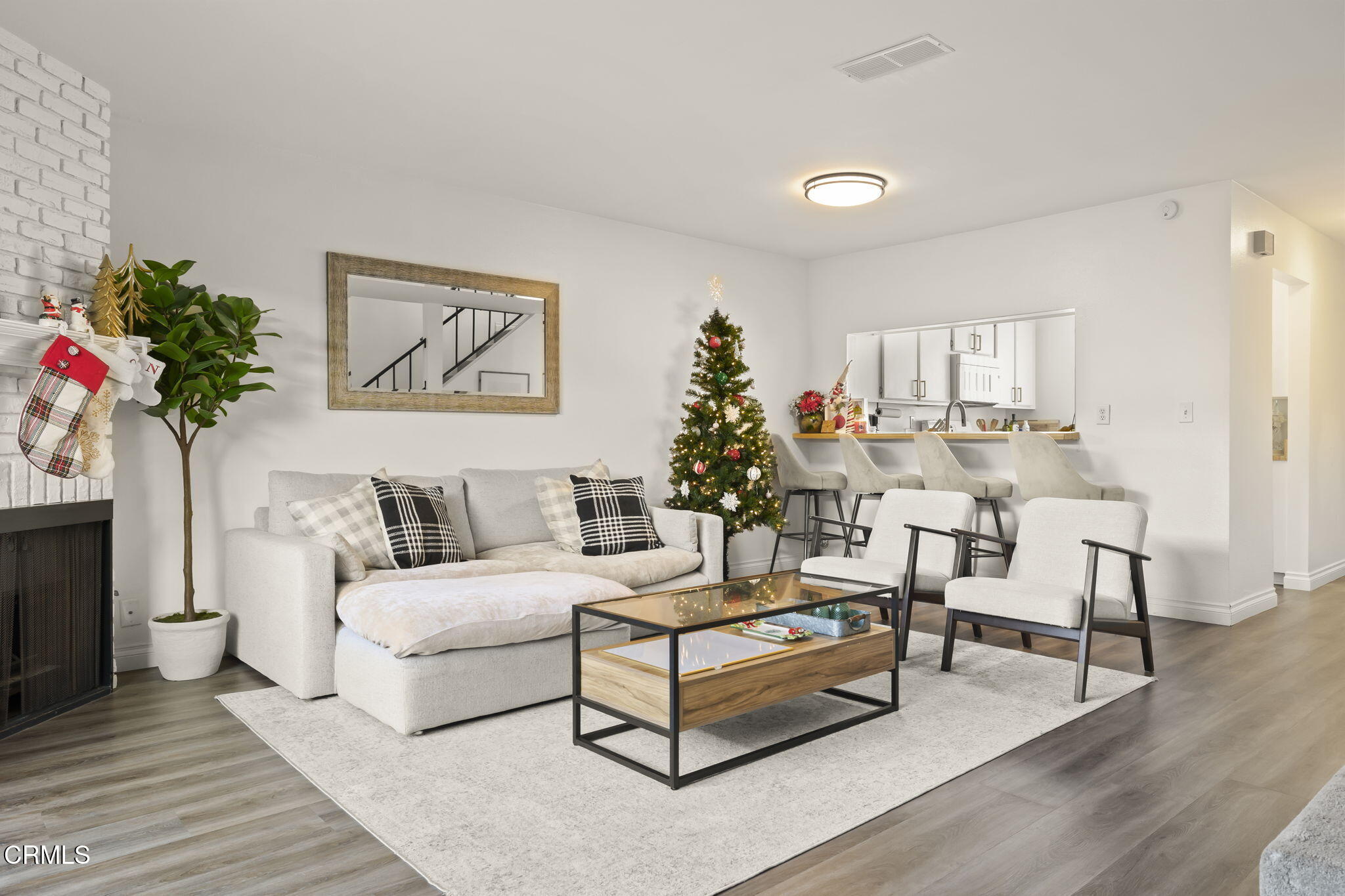 3255 Kelp Lane Oxnard, CA 93035 - Photo 9 of 45 a living room with furniture and a potted plant