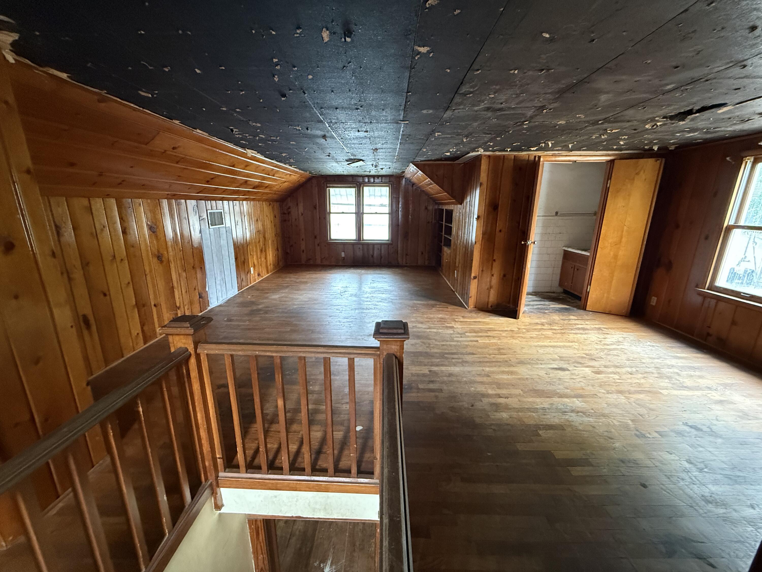 118 West Spring Street Winamac, IN 46996 - Photo 9 of 11 a view of an empty room with a fireplace