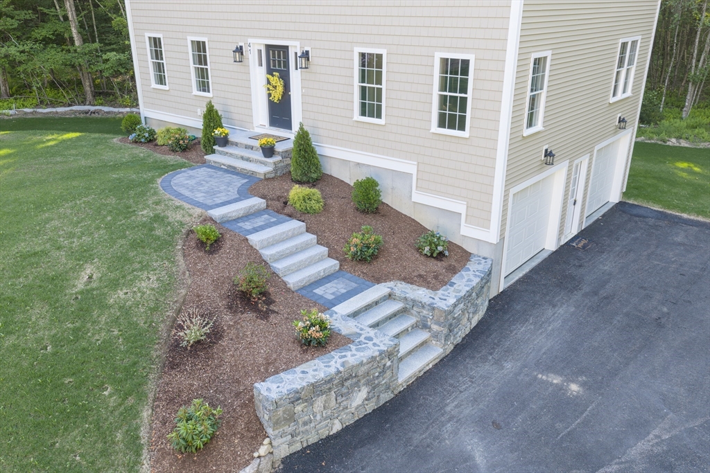 41 Martin Road Douglas, MA 01516 - Photo 5 of 40 a view of a house with backyard and sitting area