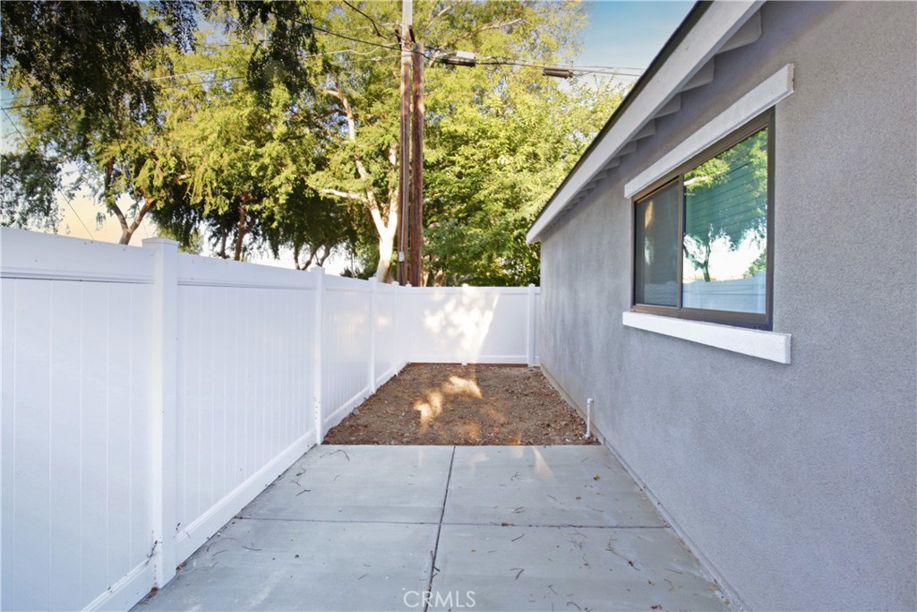 6147 Palm Avenue Riverside, CA 92506 - Photo 13 of 13 an entryway view with tree in front of it