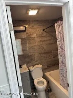 a refrigerator freezer sitting in a kitchen