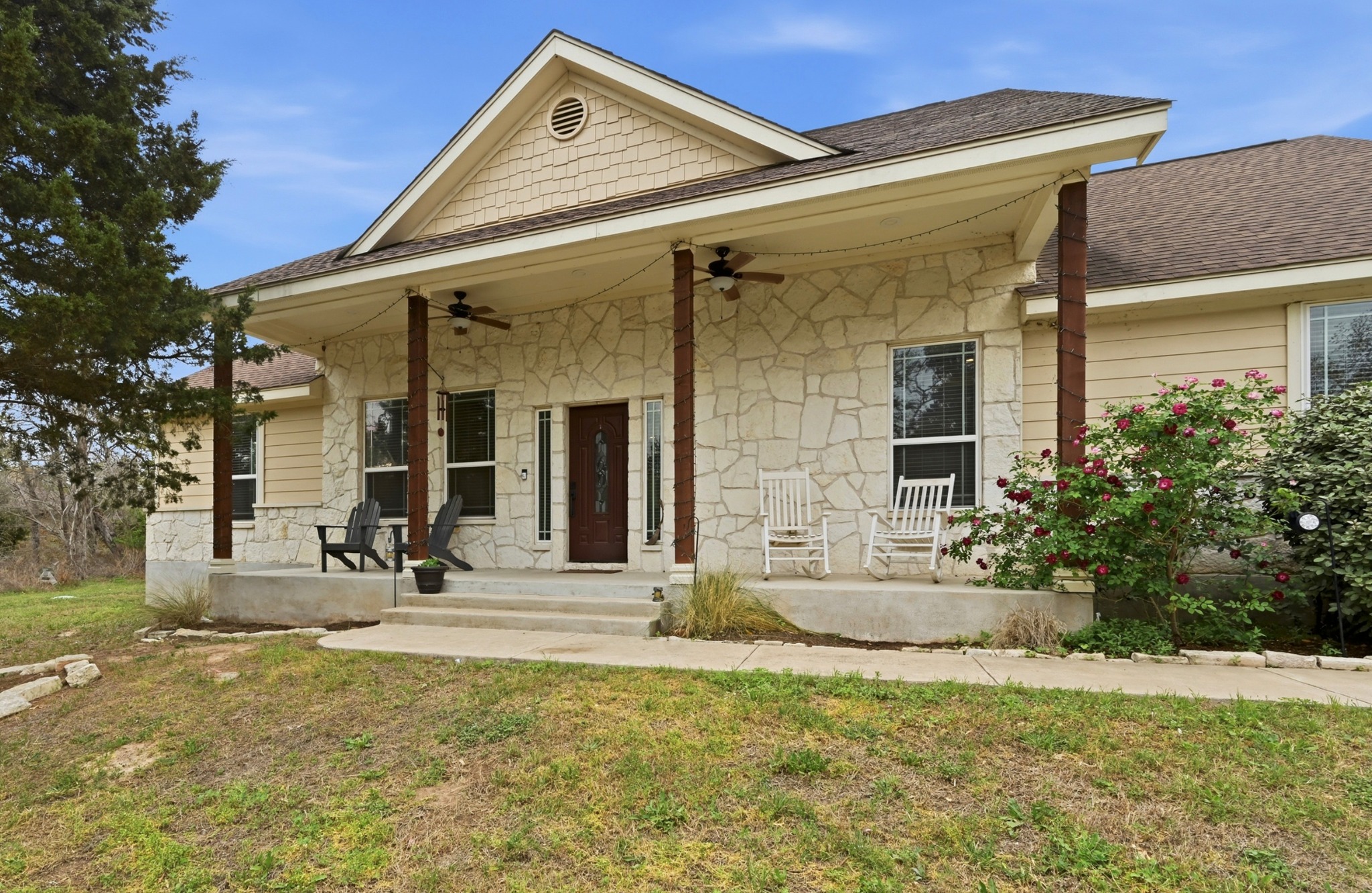 front view of a house with a yard