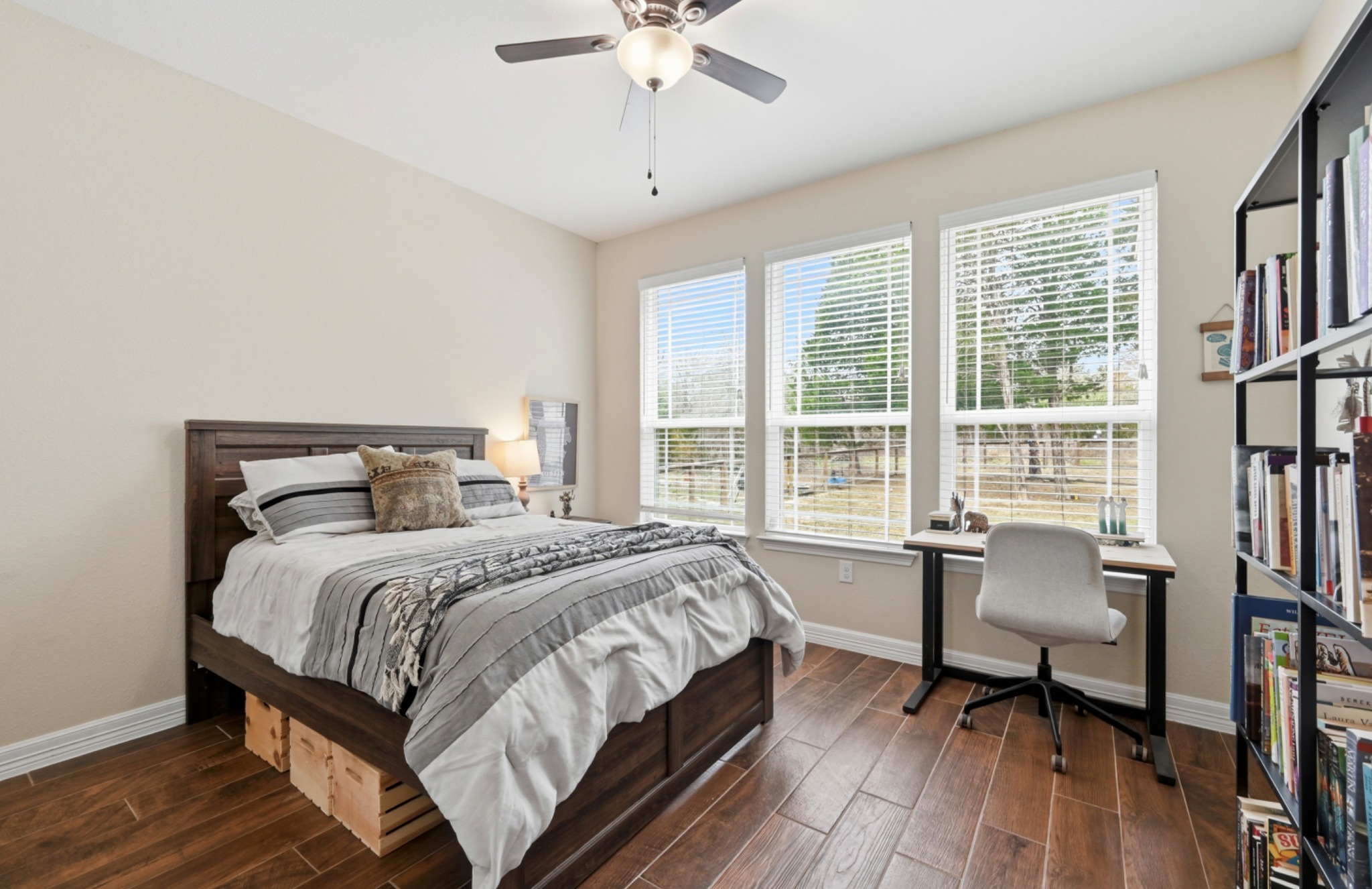 202 Cedar Hills Drive Elgin, TX 78621 - Photo 22 of 37 a bedroom with a bed and a large window