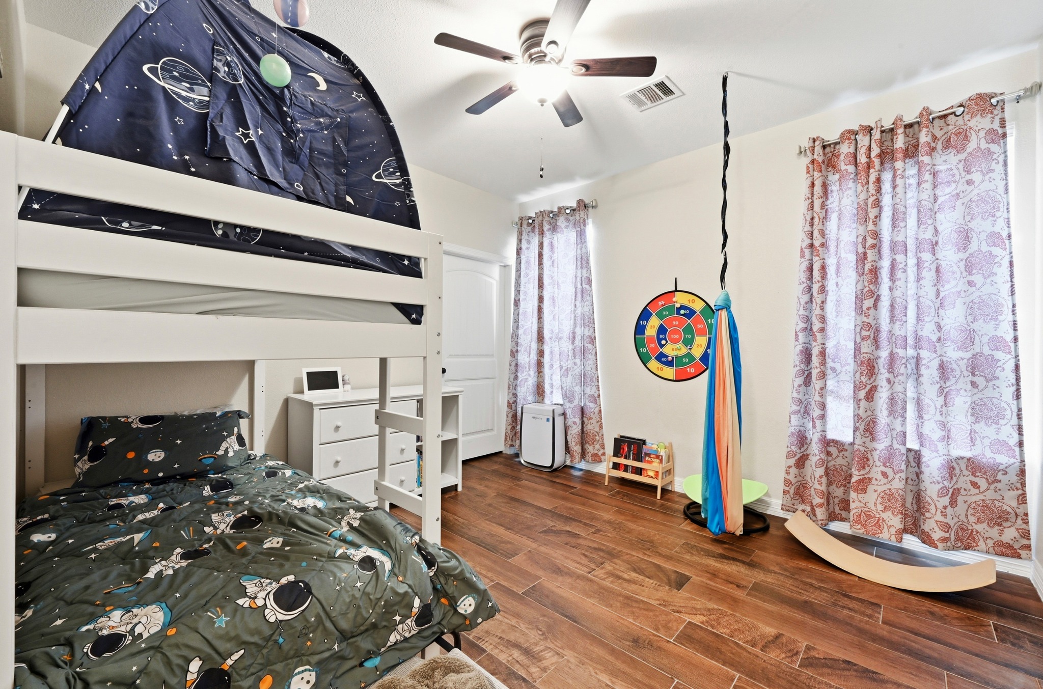 202 Cedar Hills Drive Elgin, TX 78621 - Photo 23 of 37 a bed room with a bed and a table