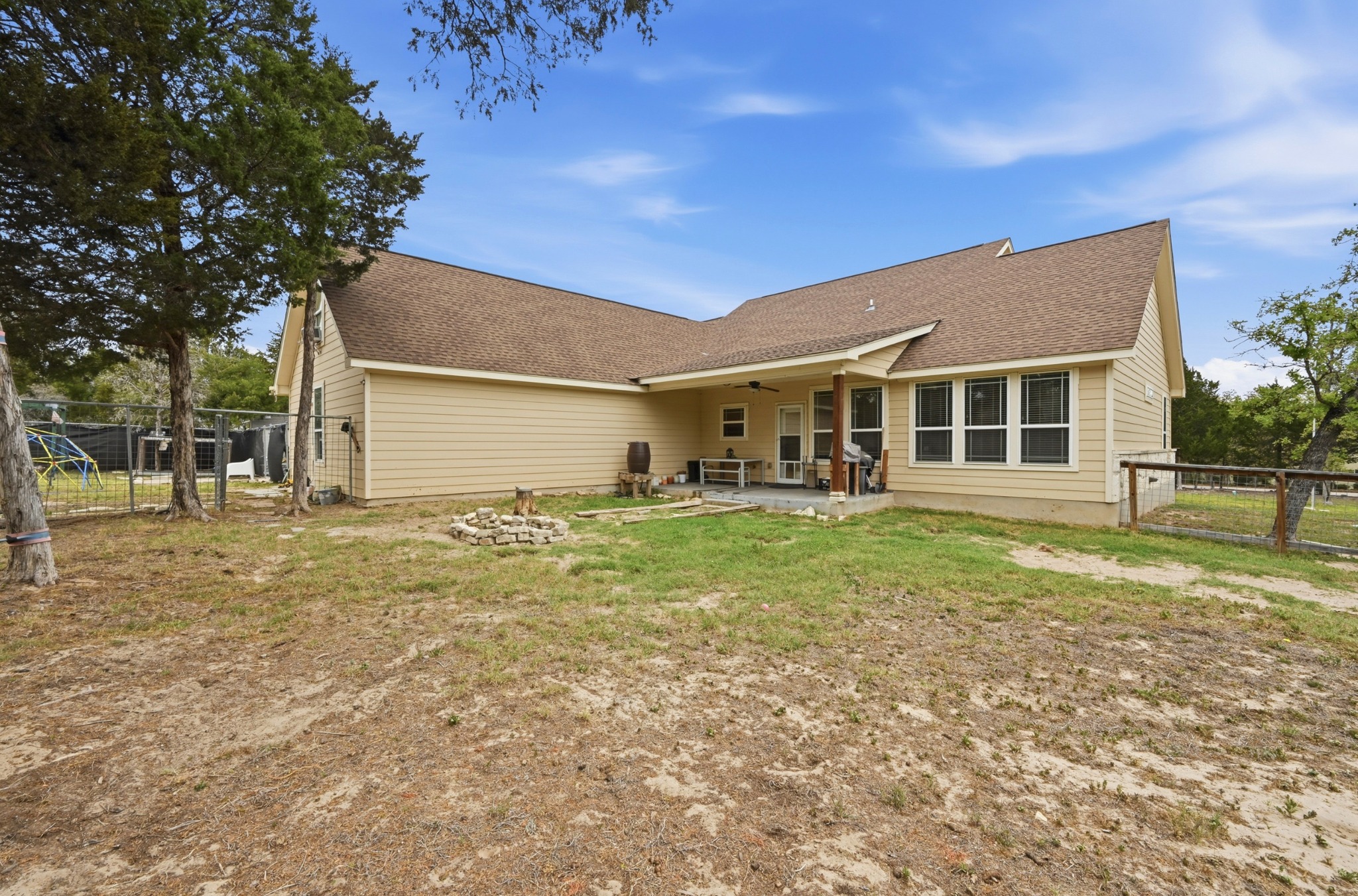 202 Cedar Hills Drive Elgin, TX 78621 - Photo 30 of 37 a front view of a house with a yard