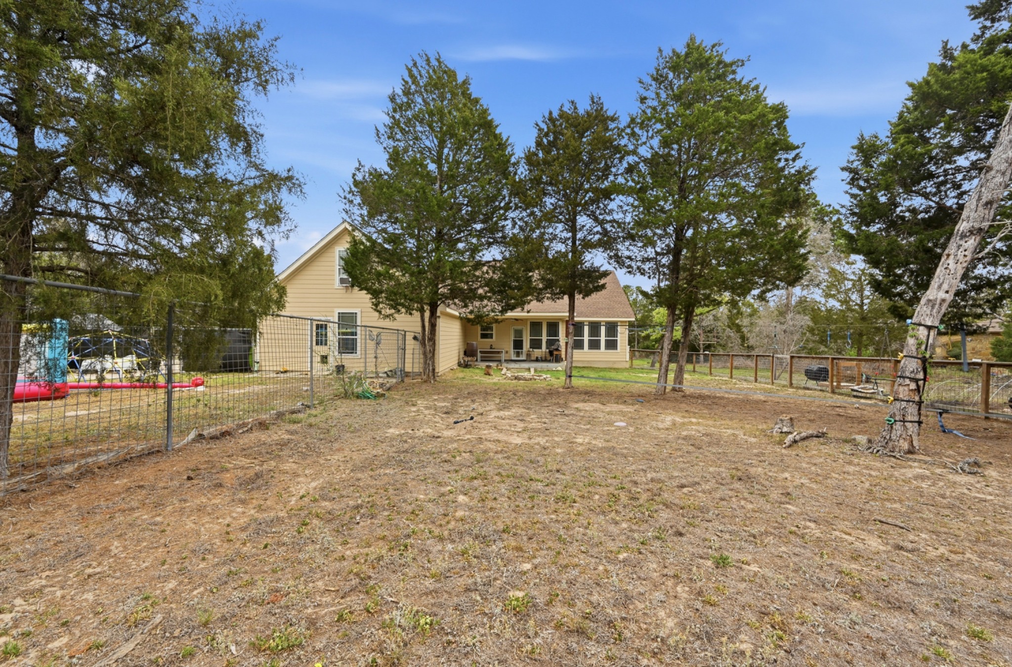 202 Cedar Hills Drive Elgin, TX 78621 - Photo 31 of 37 a front view of a house with a yard and garage