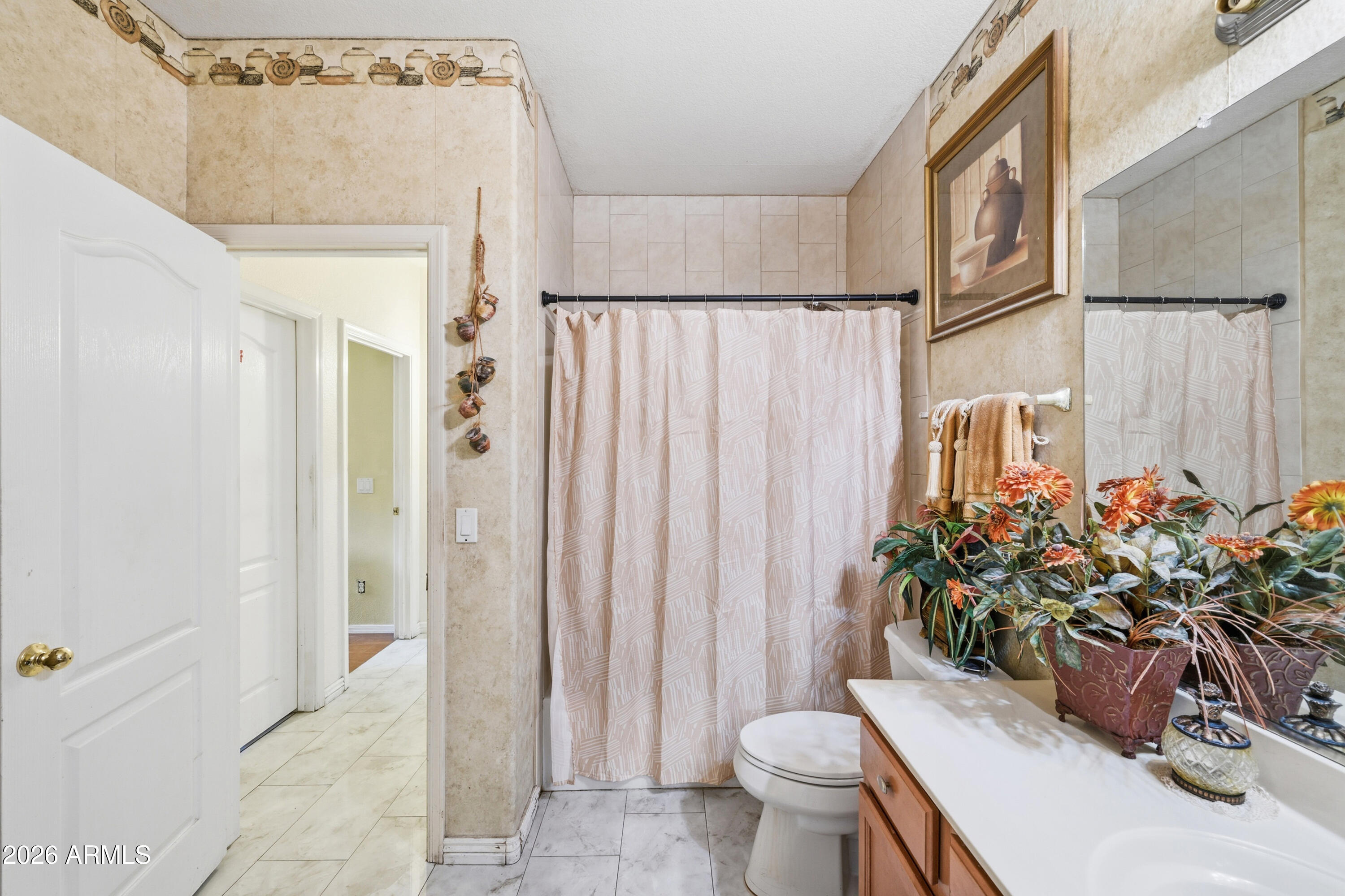 4210 South Splendor Place Gilbert, AZ 85297 - Photo 27 of 38 a view of a entryway with flower pots