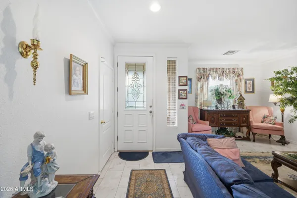 a living room with furniture and a window