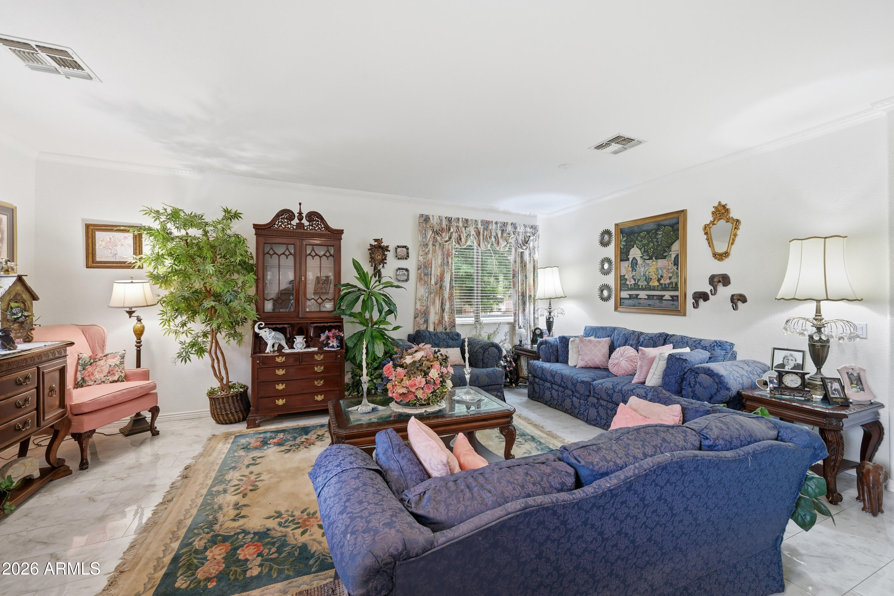 4210 South Splendor Place Gilbert, AZ 85297 - Photo 7 of 38 a living room with furniture and a flat screen tv
