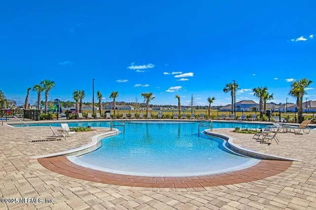 a view of a swimming pool and outdoor space