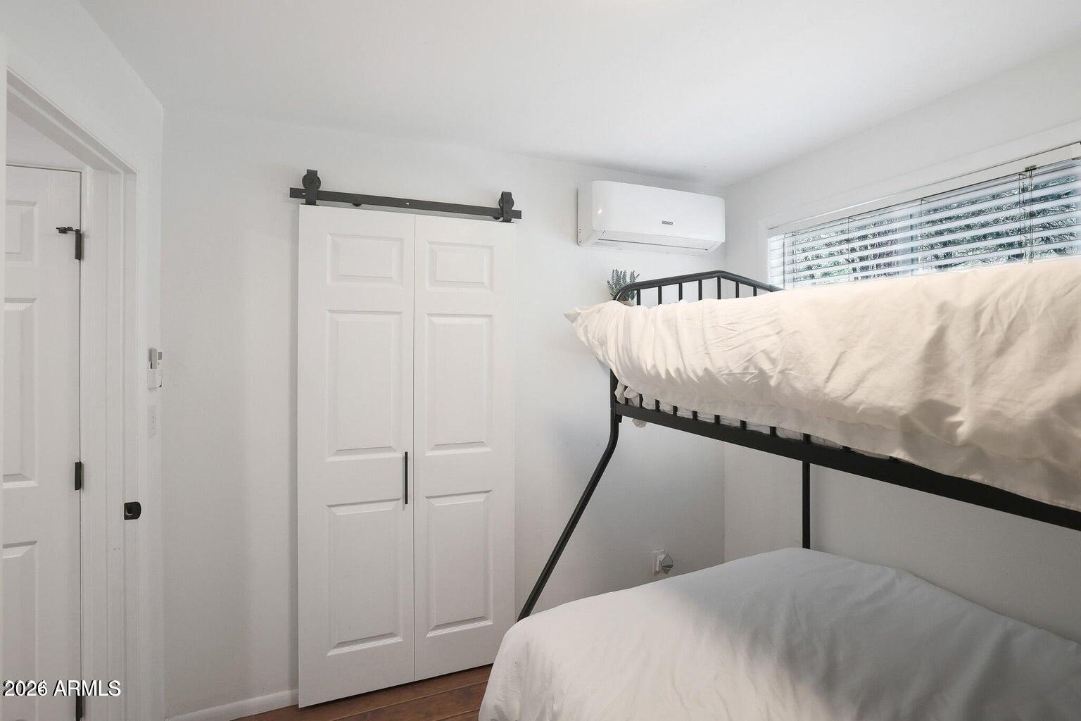 3483 Hillside Road Pine, AZ 85544 - Photo 17 of 54 a bedroom with a bed and a window