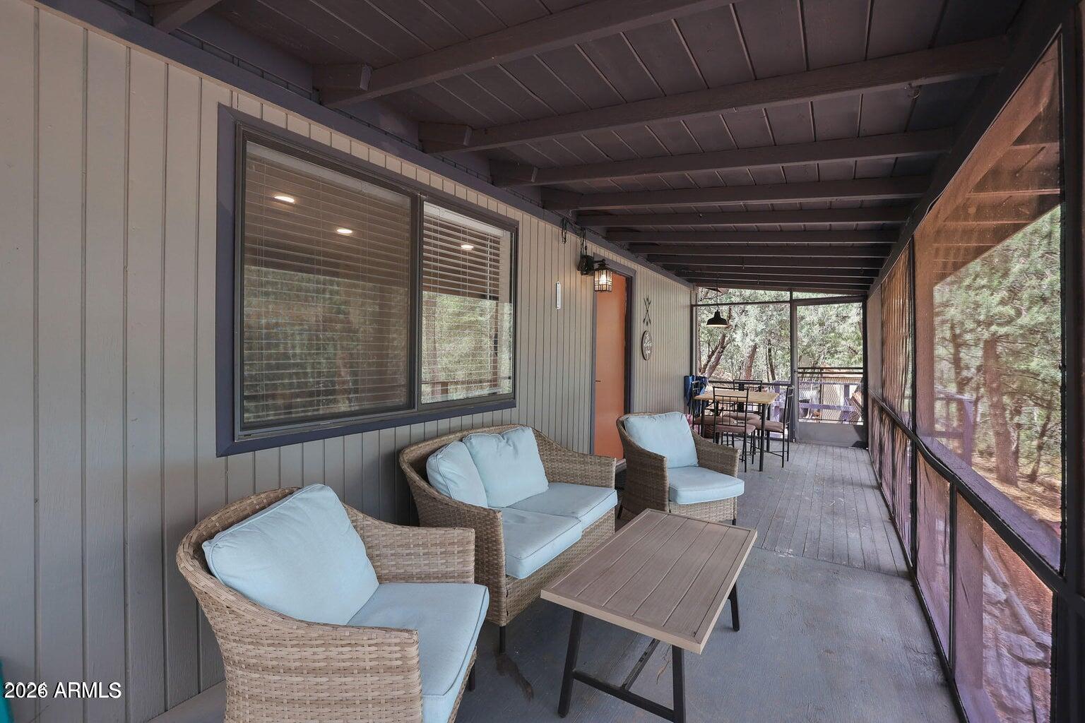 3483 Hillside Road Pine, AZ 85544 - Photo 28 of 54 a living room with furniture and a large window