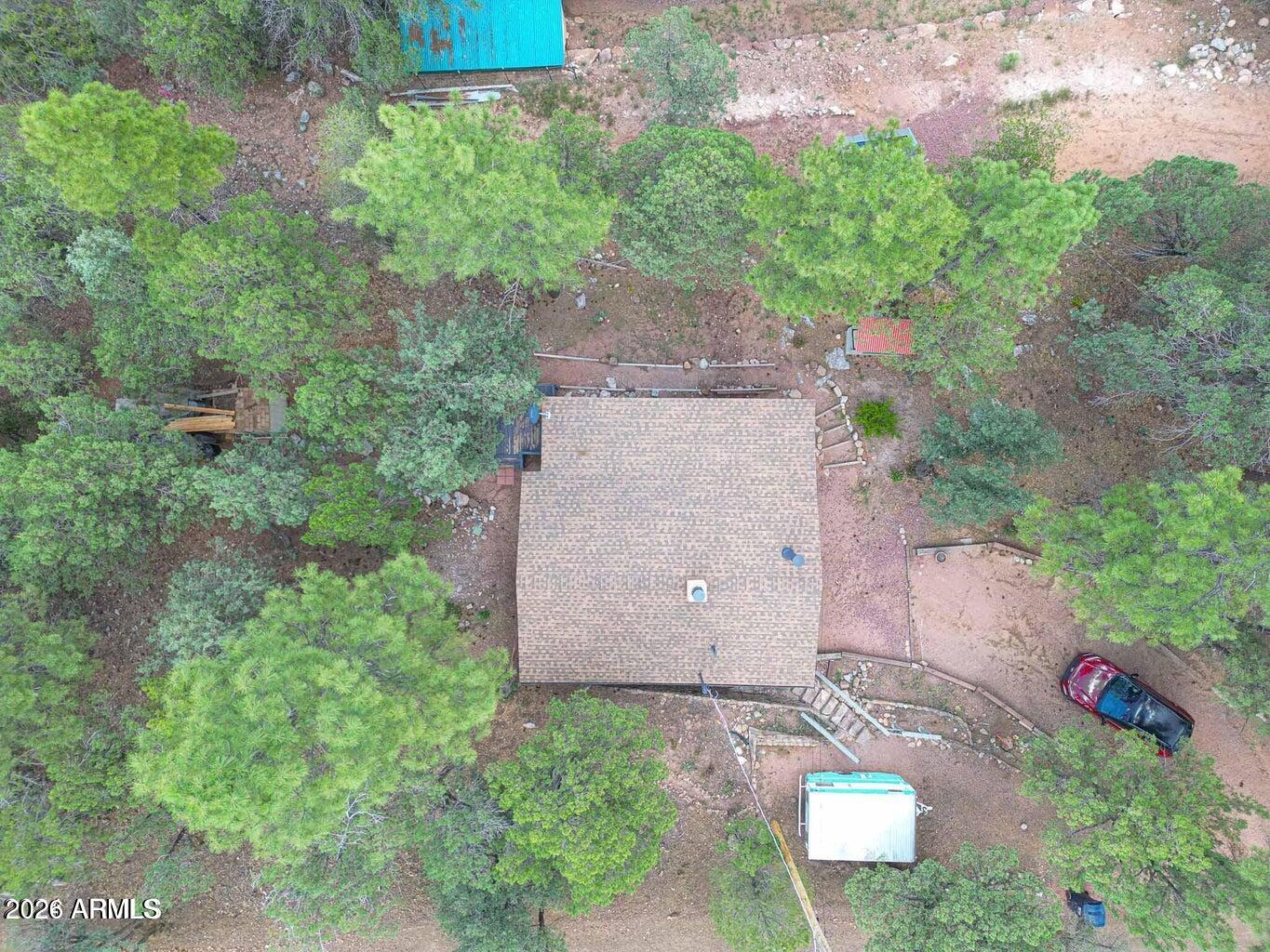 3483 Hillside Road Pine, AZ 85544 - Photo 38 of 54 an aerial view of a house with a yard and garden