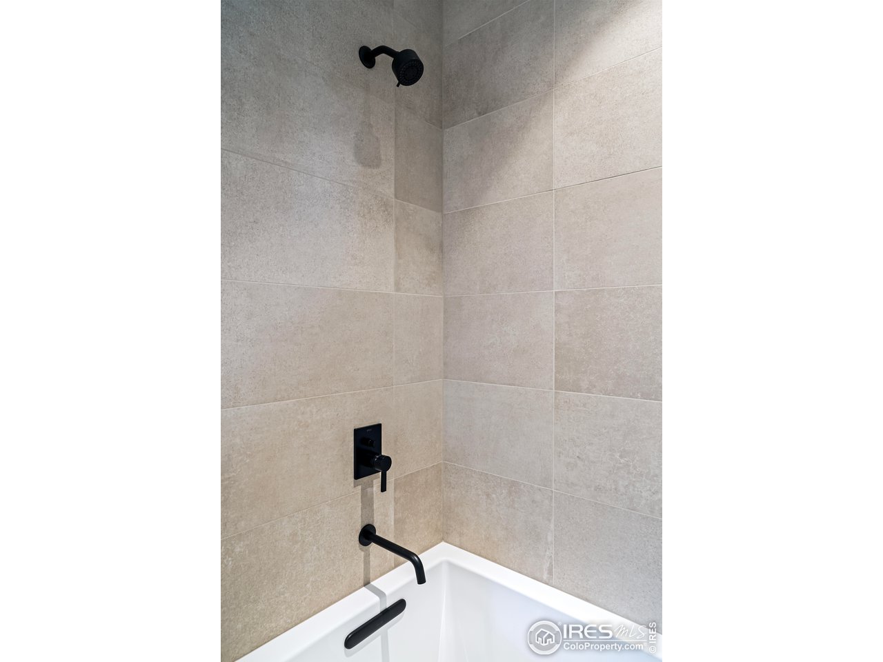 2125 Upland Avenue Boulder, CO 80304 - Photo 25 of 36 a bathroom with a sink and a shower