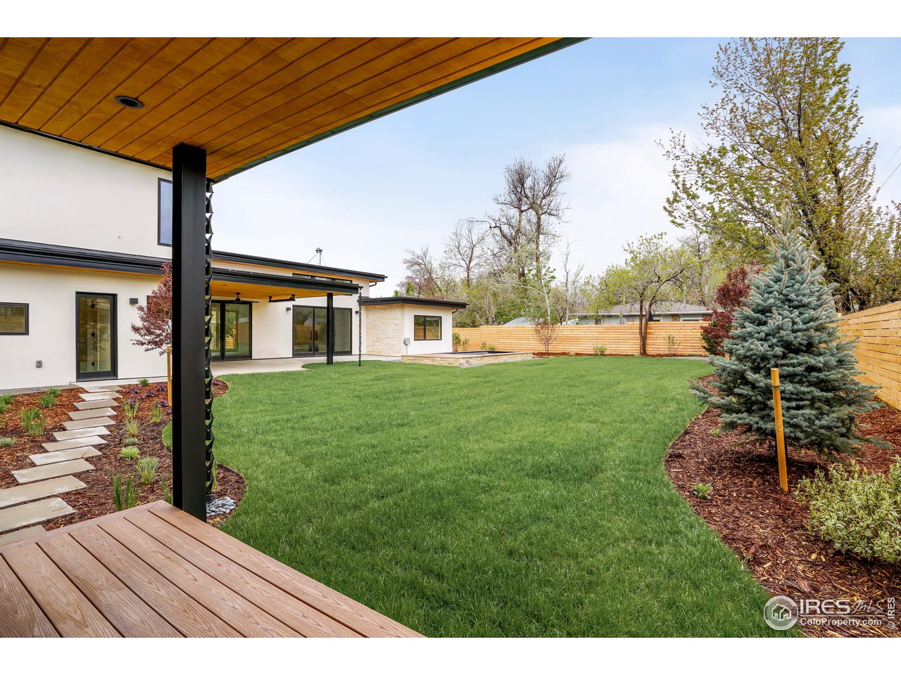 2125 Upland Avenue Boulder, CO 80304 - Photo 30 of 36 a front view of a house with garden