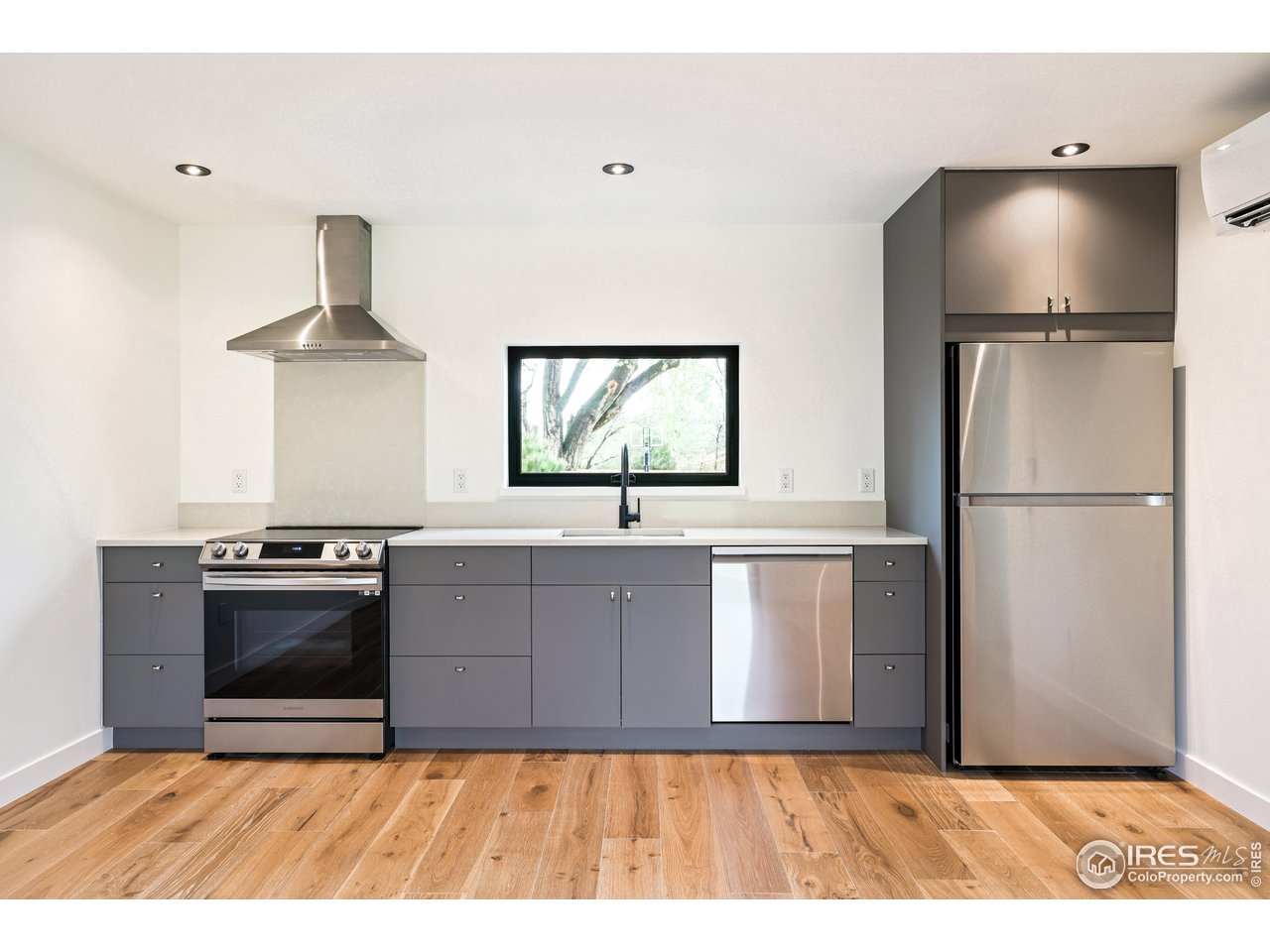 2125 Upland Avenue Boulder, CO 80304 - Photo 31 of 36 a kitchen with a refrigerator and a stove