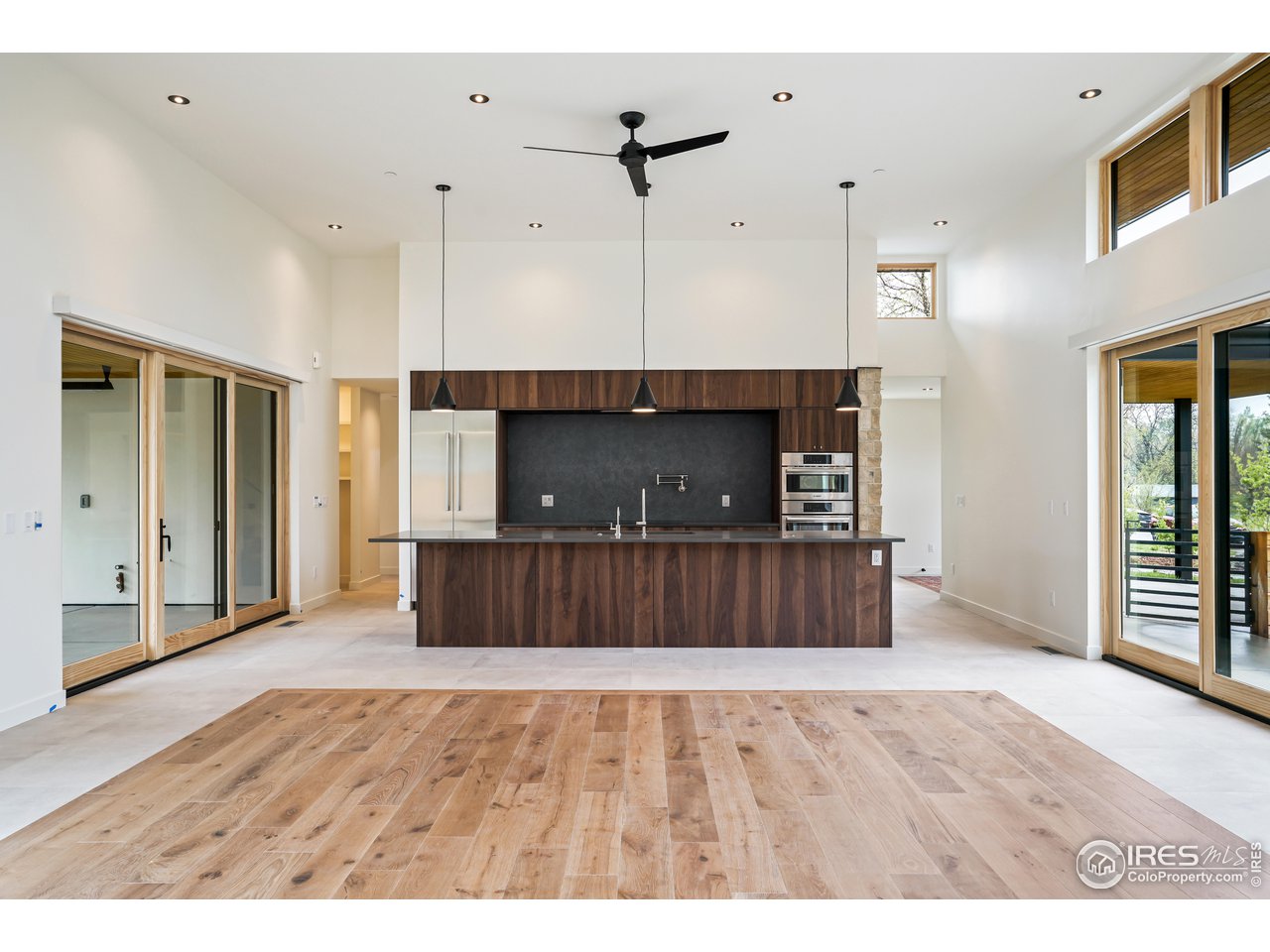 2125 Upland Avenue Boulder, CO 80304 - Photo 9 of 36 a view of kitchen with wooden floor and window