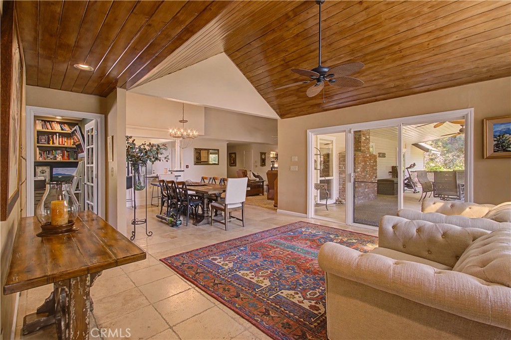 1605 Ridge Drive Merced, CA 95340 - Photo 19 of 63 The door on the left leads to the office, and the sliding door to the right leads to the covered Patio and Outdoor Kitchen