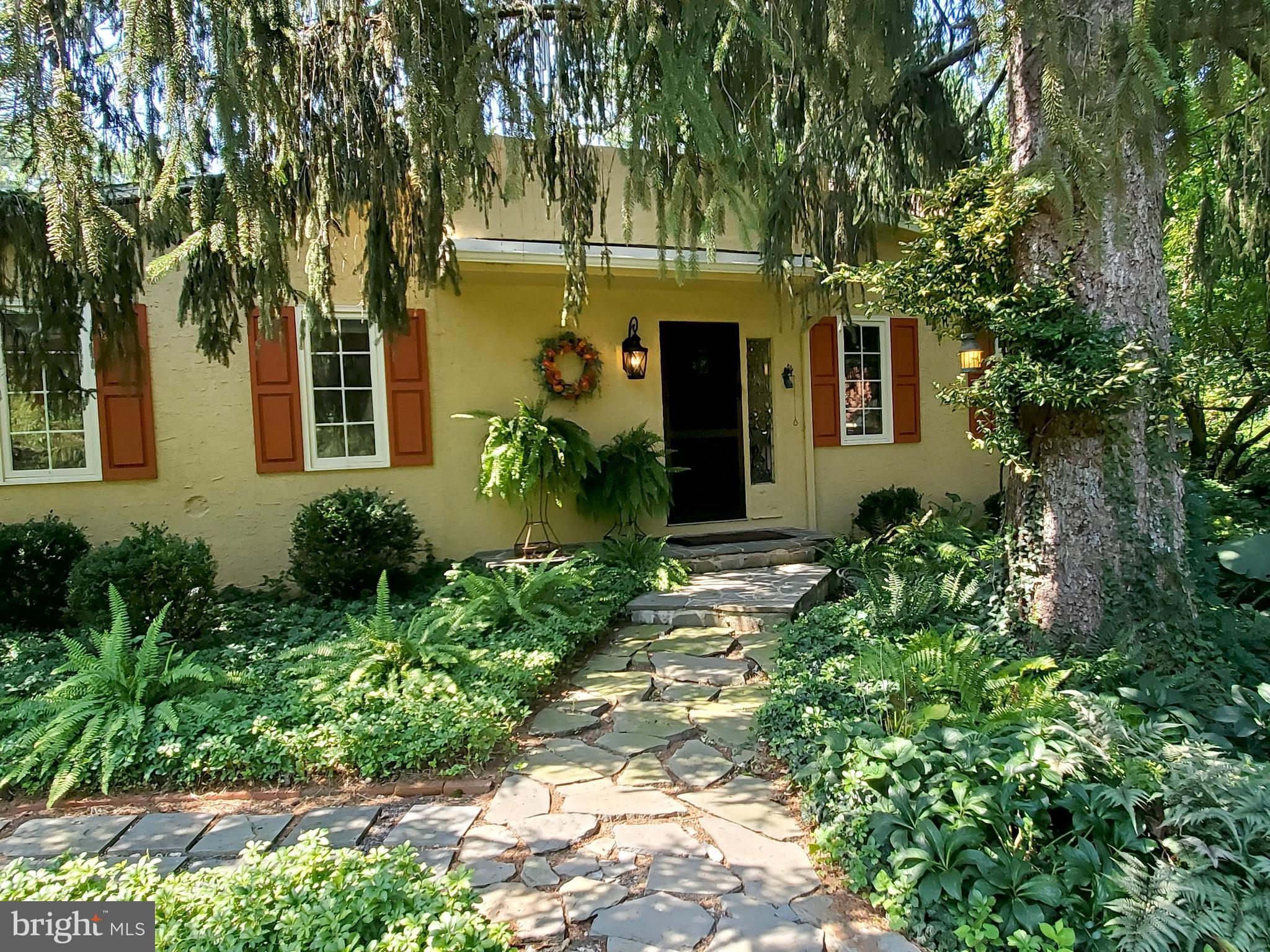 2125 Old Woods Road Green Lane, PA 18054 - Photo 2 of 53 a front view of a house with garden