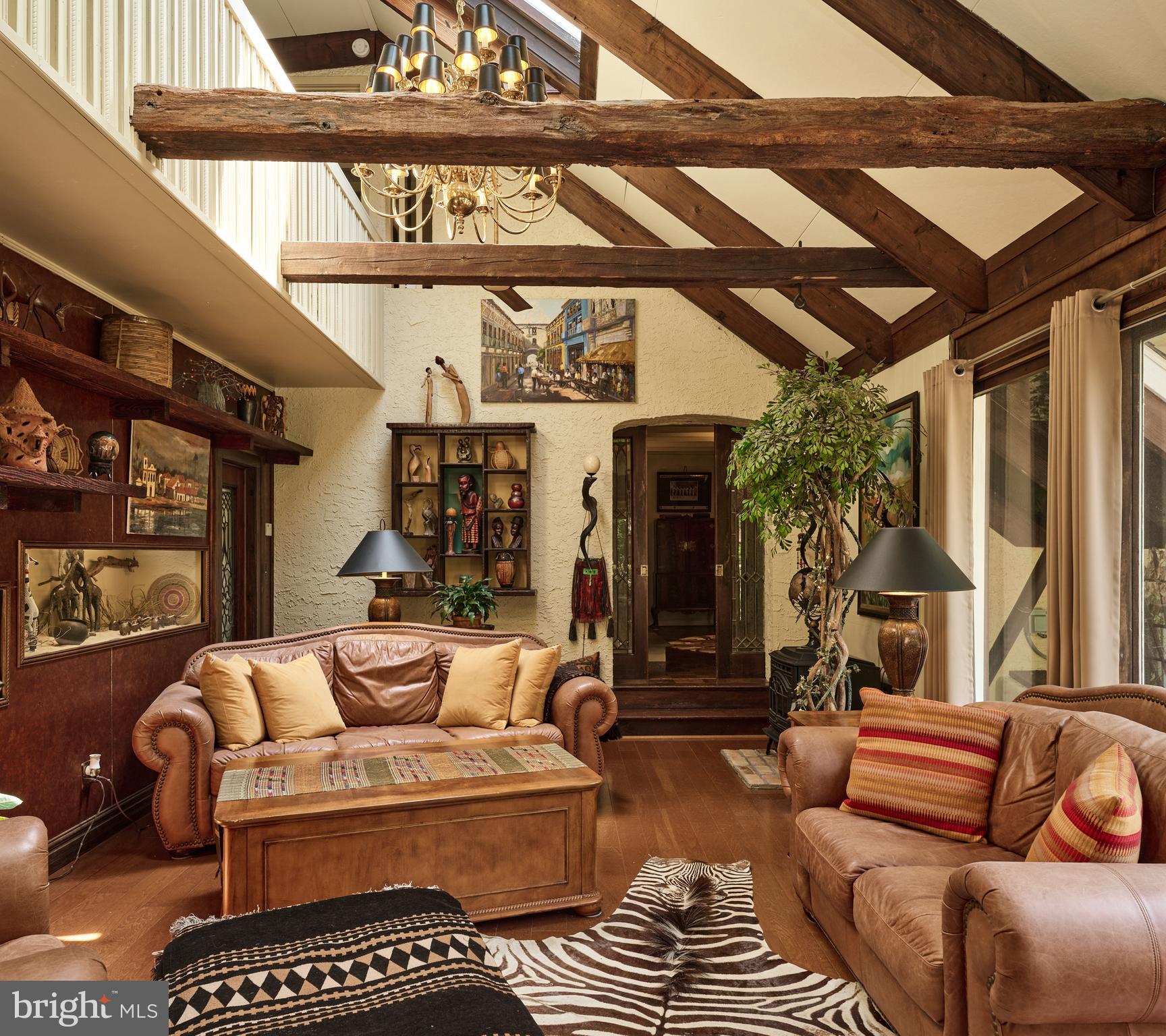 2125 Old Woods Road Green Lane, PA 18054 - Photo 23 of 53 a living room with furniture a lamp and a large window