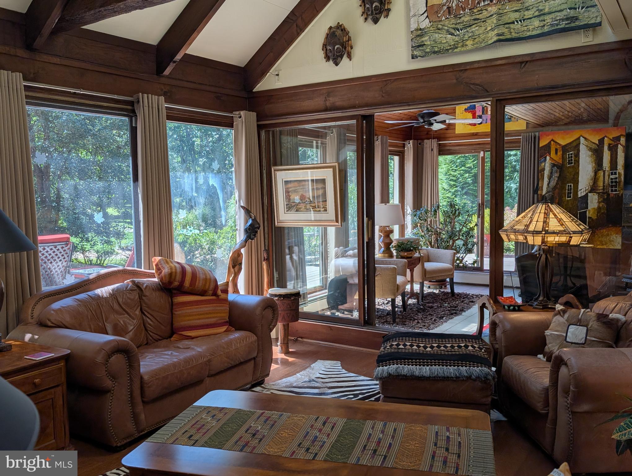 2125 Old Woods Road Green Lane, PA 18054 - Photo 24 of 53 a living room with furniture and floor to ceiling windows