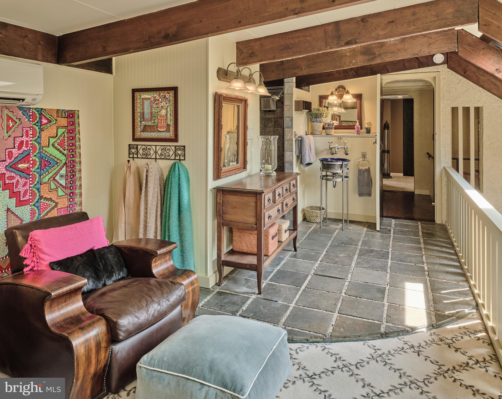 2125 Old Woods Road Green Lane, PA 18054 - Photo 29 of 53 a living room with furniture and a rug