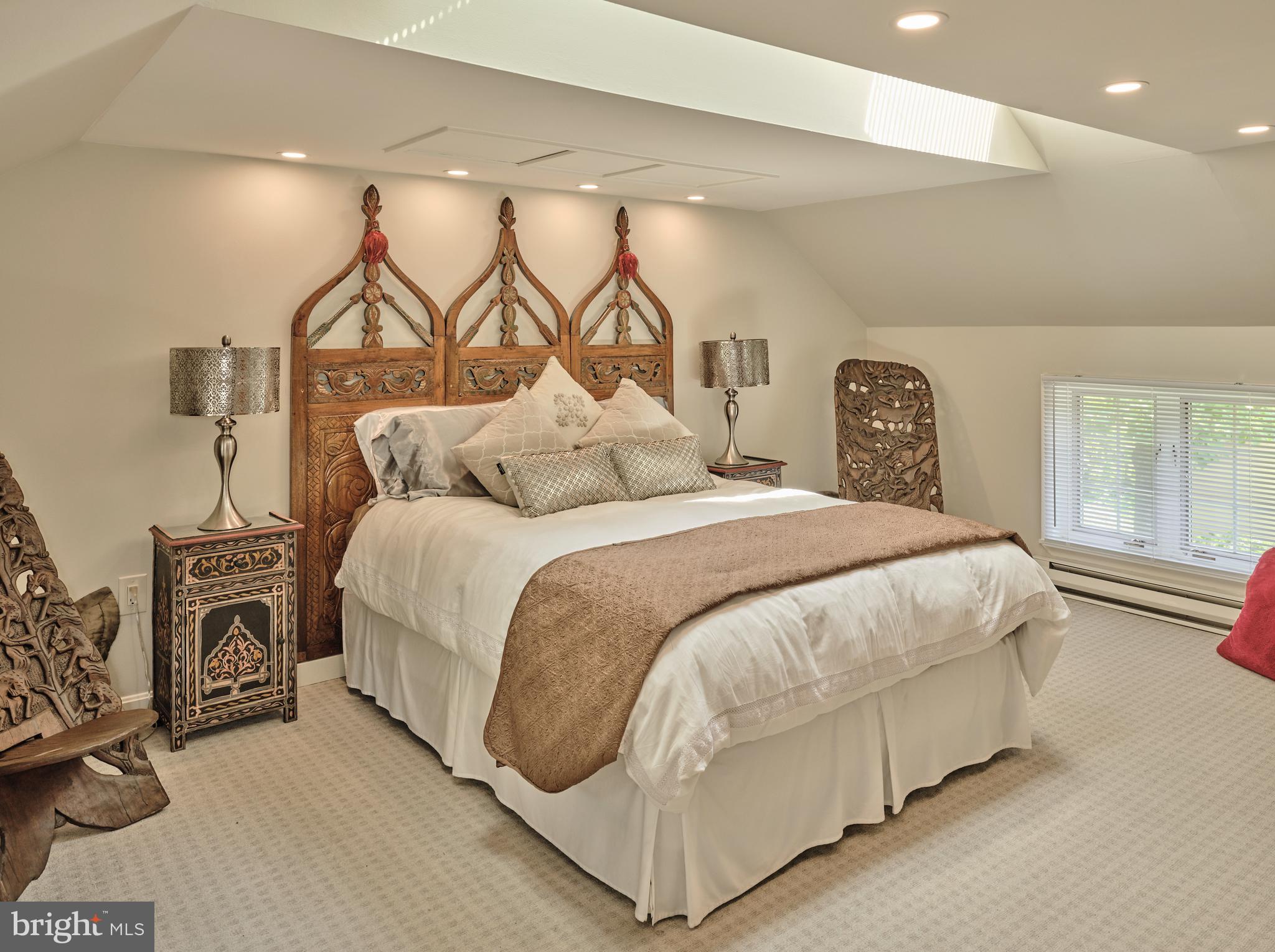 2125 Old Woods Road Green Lane, PA 18054 - Photo 33 of 53 a bedroom with a bed and a night stand