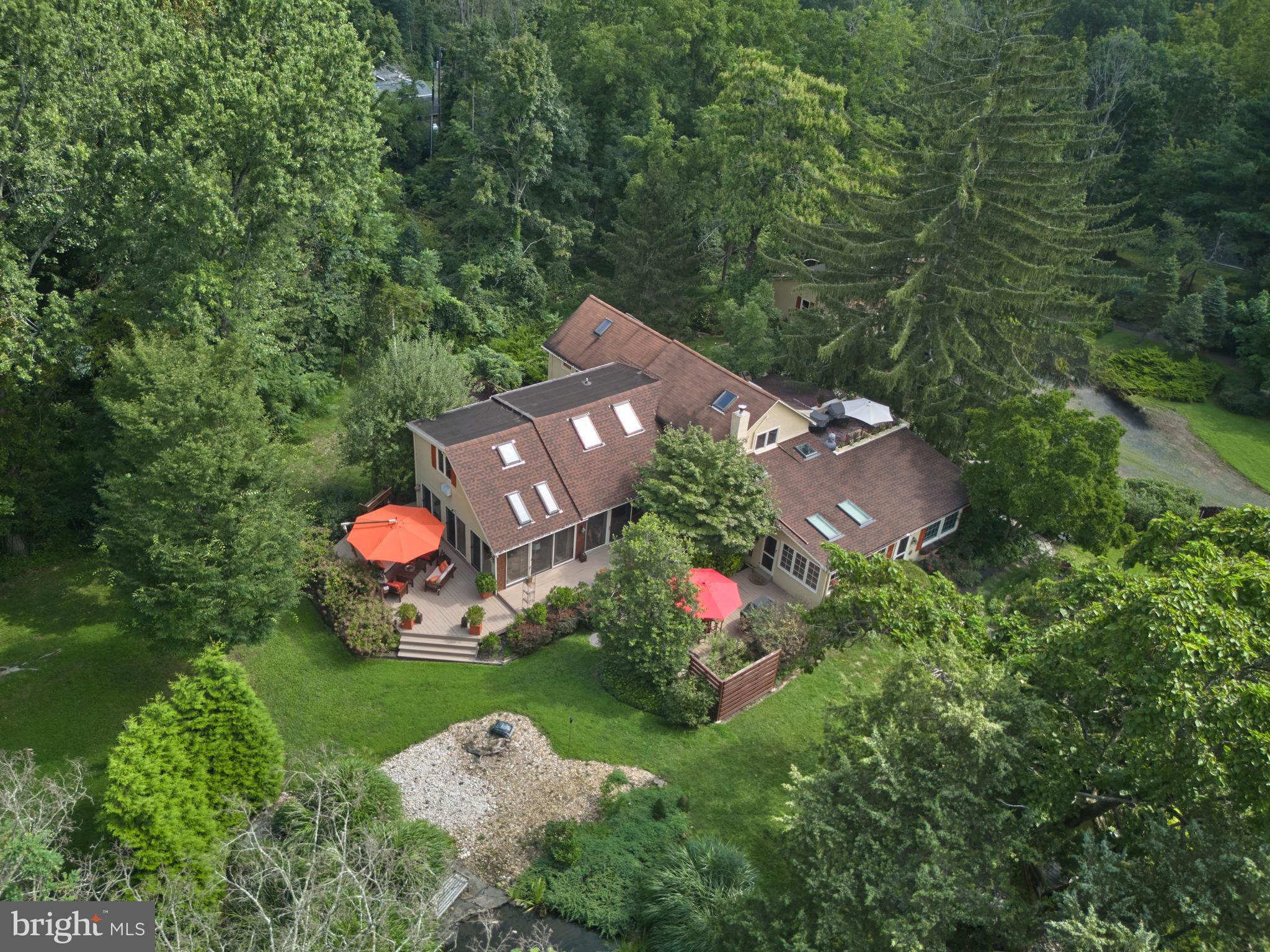 2125 Old Woods Road Green Lane, PA 18054 - Photo 47 of 53 a view of a table and chairs in back yard
