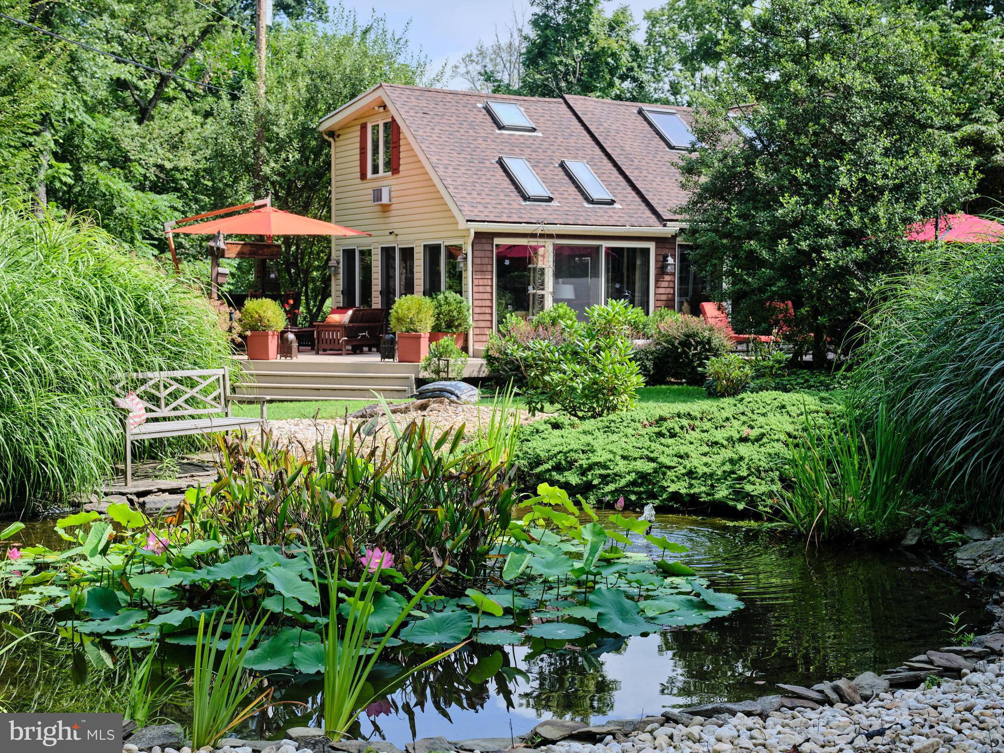 2125 Old Woods Road Green Lane, PA 18054 - Photo 5 of 53 a front view of a house with garden