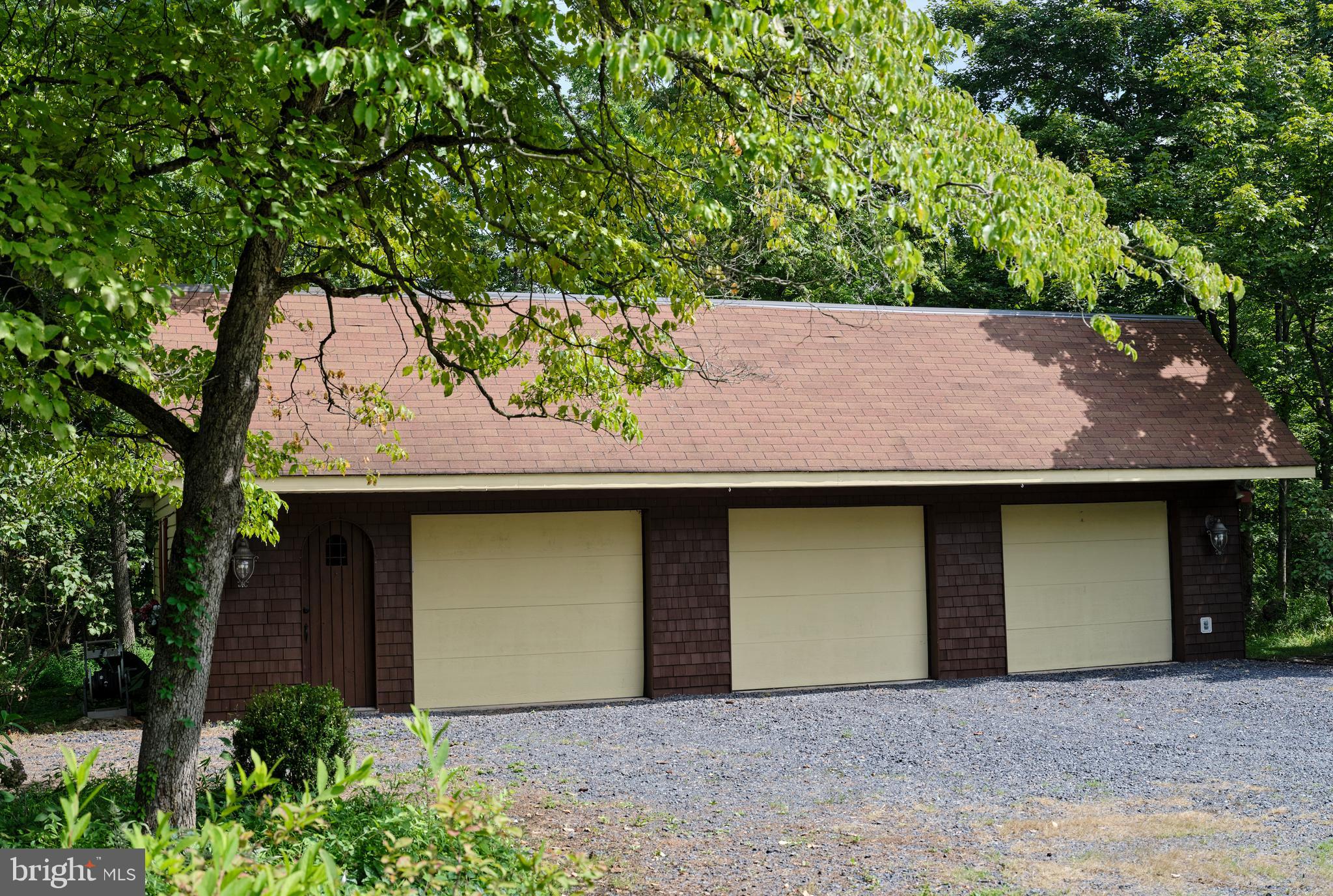 2125 Old Woods Road Green Lane, PA 18054 - Photo 51 of 53 a house that has a tree in front of it