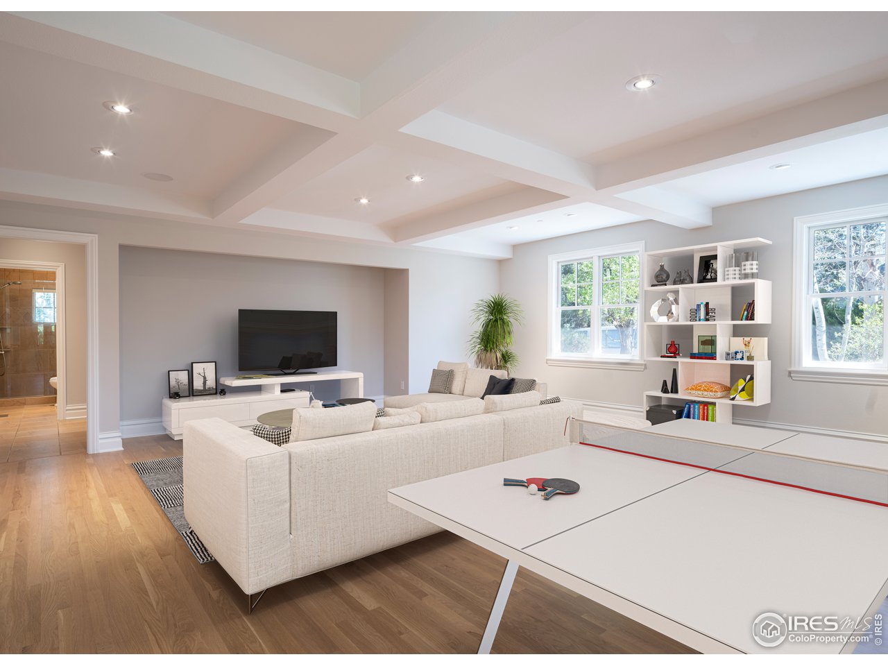 2205 Topaz Drive Boulder, CO 80304 - Photo 19 of 33 a living room with furniture and a flat screen tv