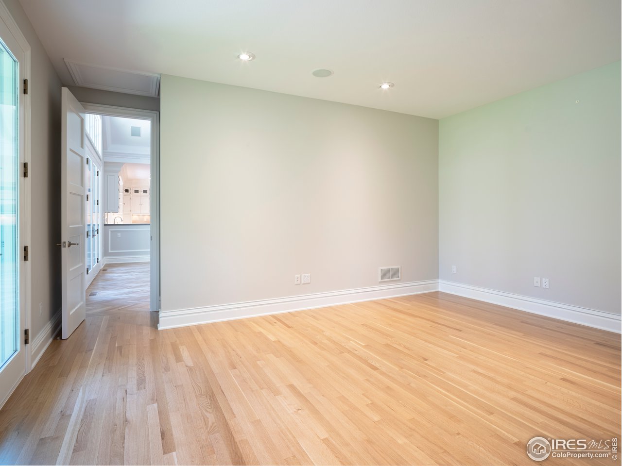 2205 Topaz Drive Boulder, CO 80304 - Photo 23 of 33 a view of an empty room with wooden floor