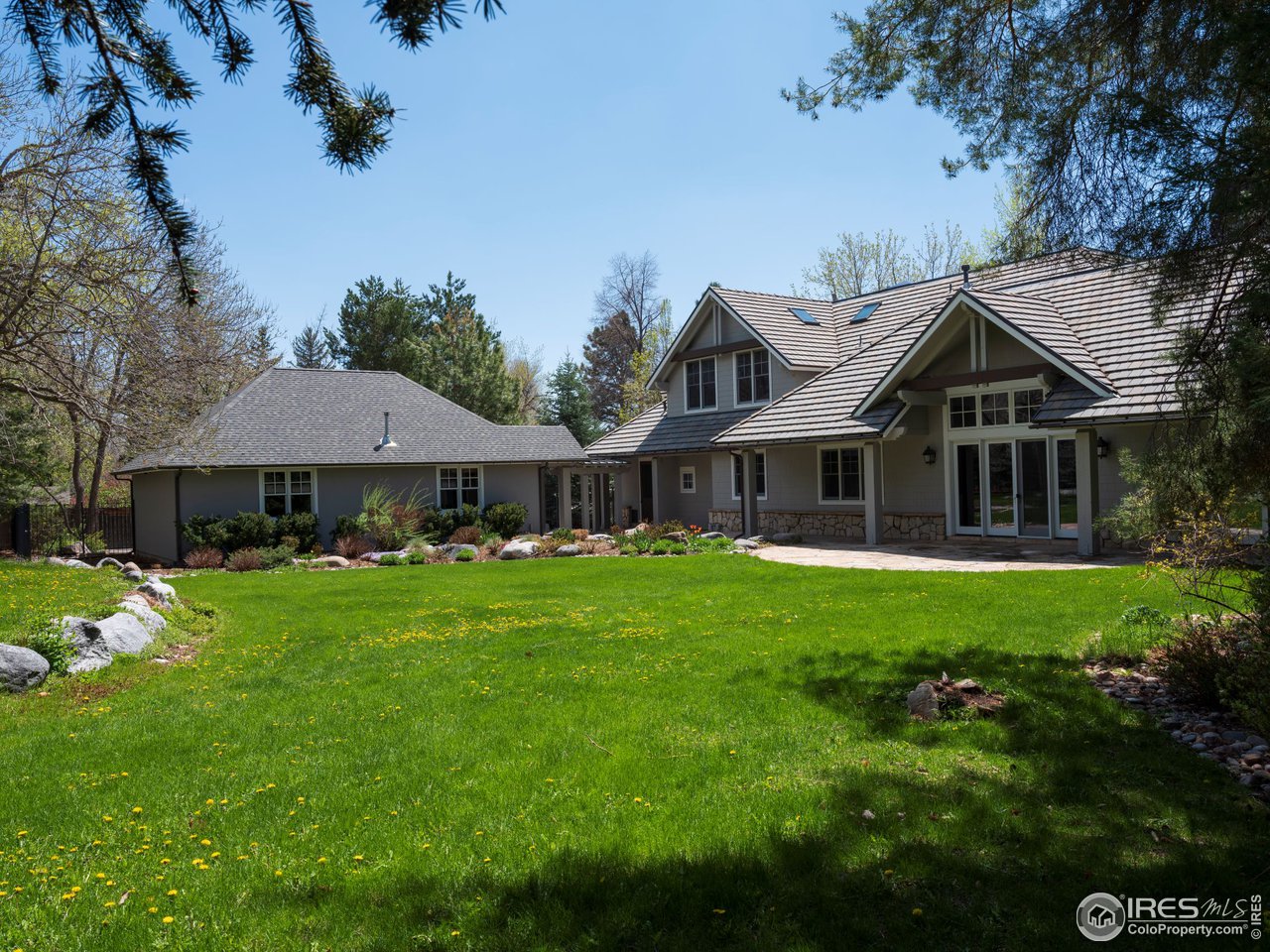 2205 Topaz Drive Boulder, CO 80304 - Photo 3 of 33 a front view of a house with garden