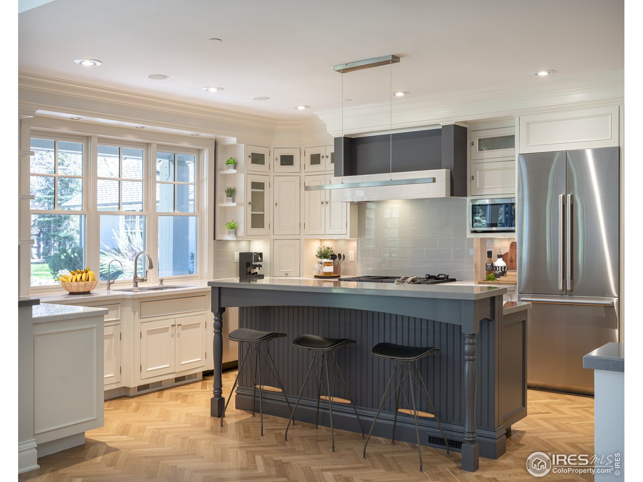 2205 Topaz Drive Boulder, CO 80304 - Photo 4 of 33 a kitchen with granite countertop a sink stove and refrigerator
