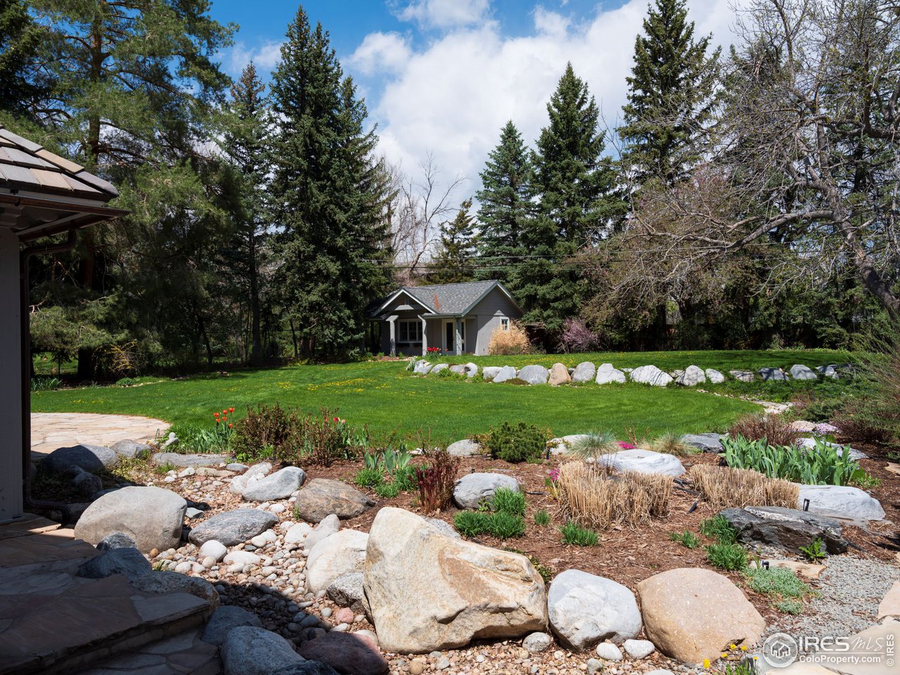2205 Topaz Drive Boulder, CO 80304 - Photo 8 of 33 a front view of a house with garden