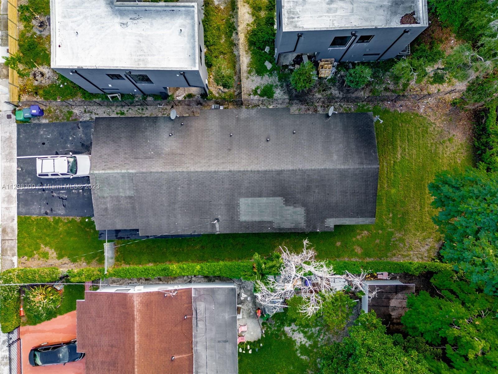 Buena Vista Miami, FL 33127 - Photo 8 of 15 an aerial view of a house with a garden and a yard