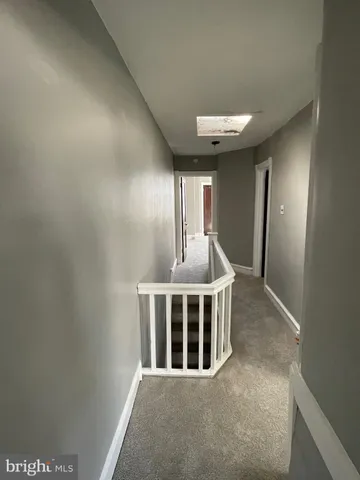 a view of a livingroom with a staircase