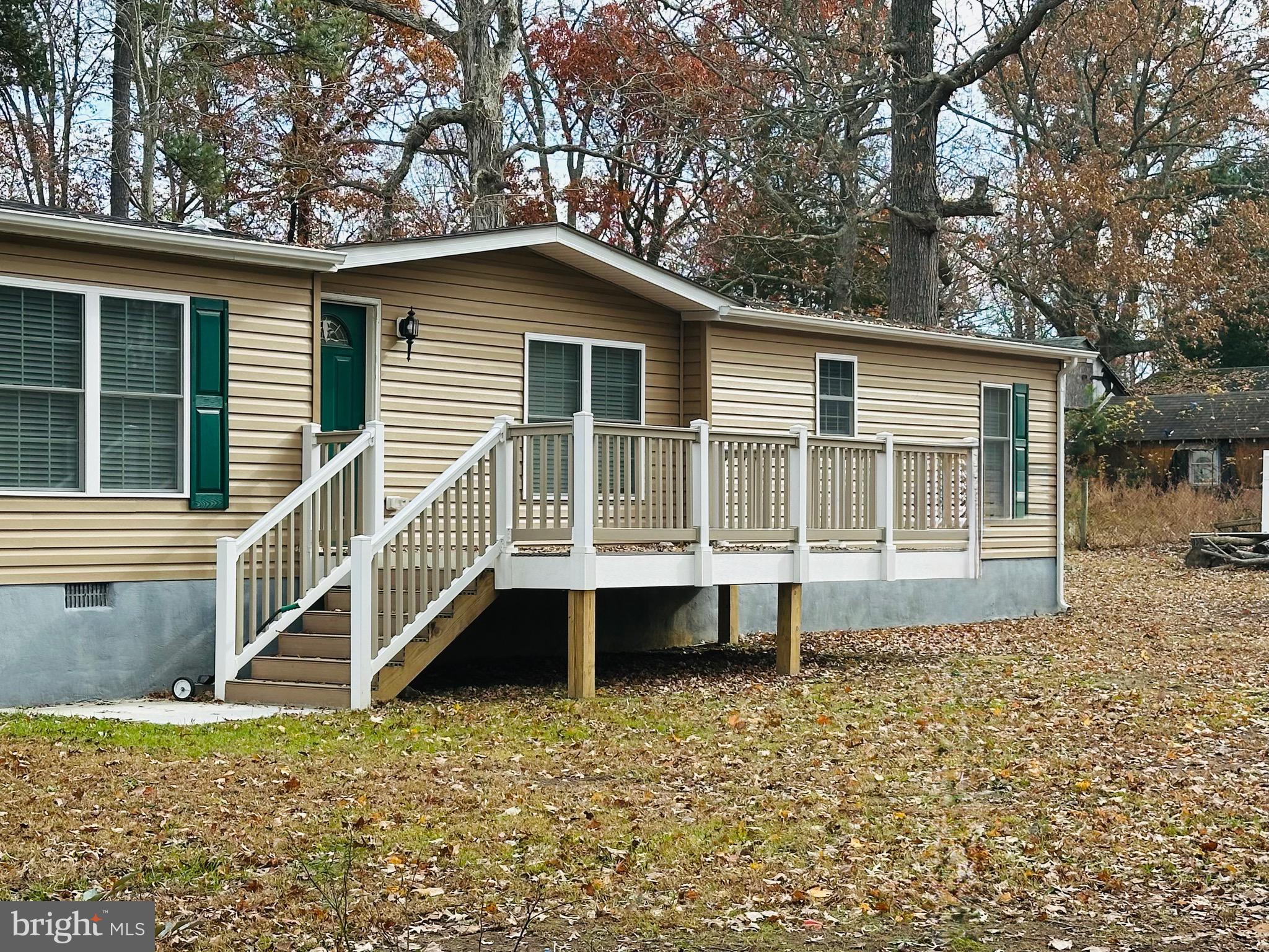 a house with trees in the background