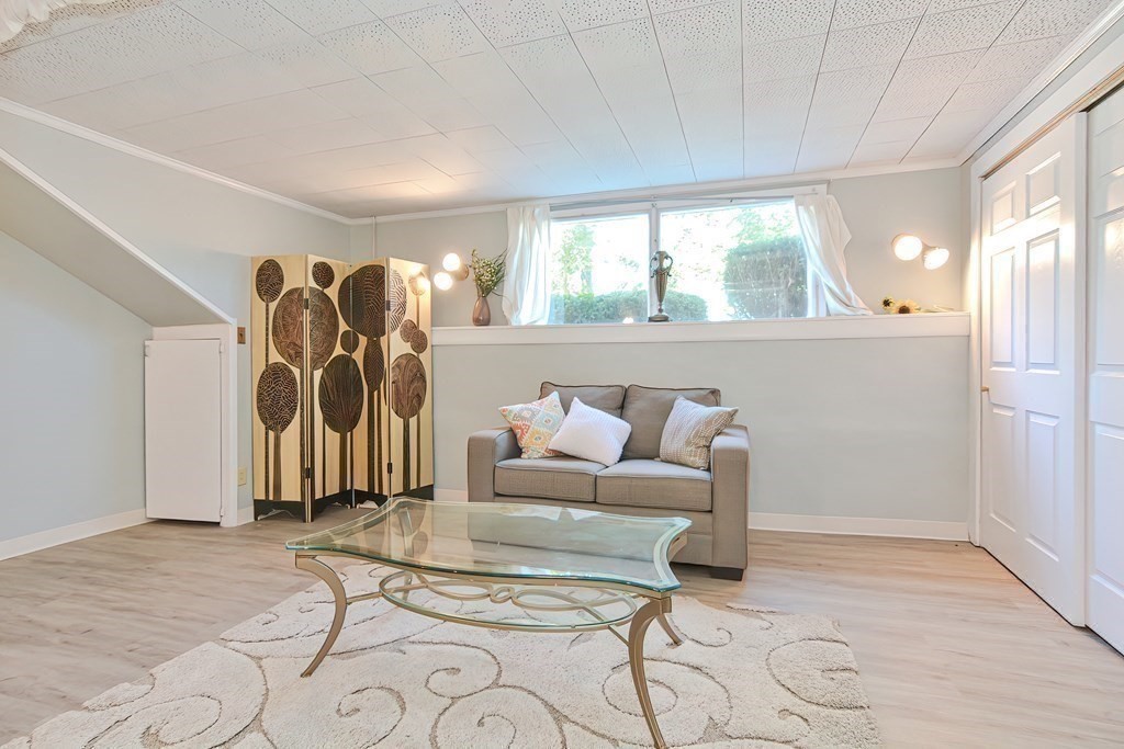 24 Cherry Road Framingham, MA 01701 - Photo 26 of 30 a living room with furniture and a window