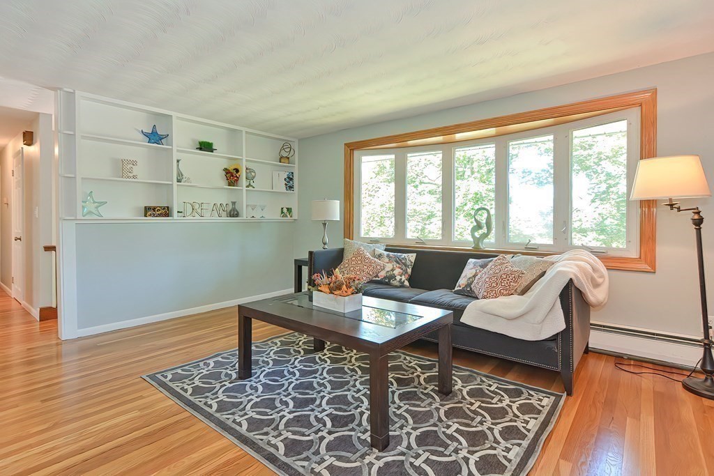 24 Cherry Road Framingham, MA 01701 - Photo 4 of 30 a living room with furniture and a wooden floor