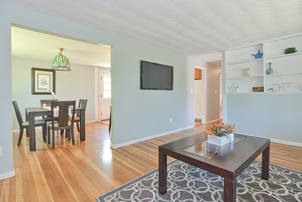 24 Cherry Road Framingham, MA 01701 - Photo 7 of 30 a view of a dining room with furniture and wooden floor