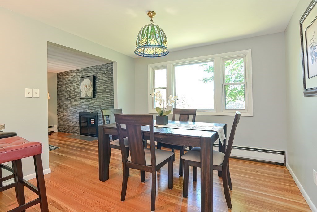 24 Cherry Road Framingham, MA 01701 - Photo 8 of 30 a view of a dining room with furniture window and wooden floor
