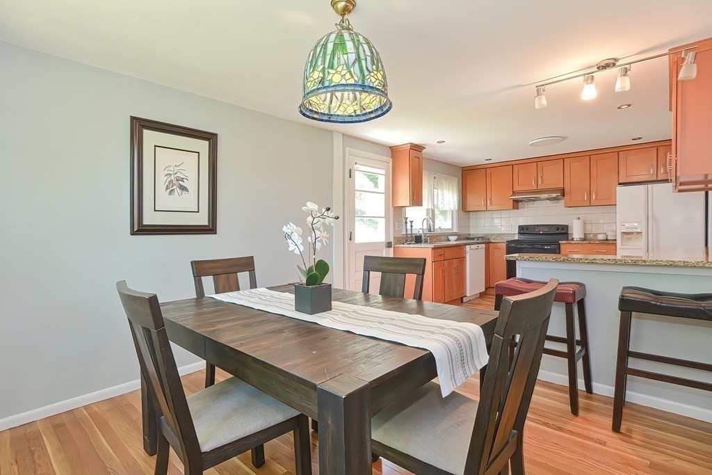 24 Cherry Road Framingham, MA 01701 - Photo 9 of 30 a view of a dining room with furniture window and wooden floor