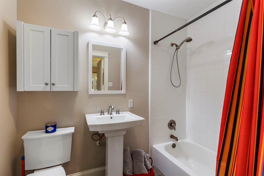 982 West 42nd Street Houston, TX 77018 - Photo 16 of 20 a bathroom with a sink vanity tub and shower